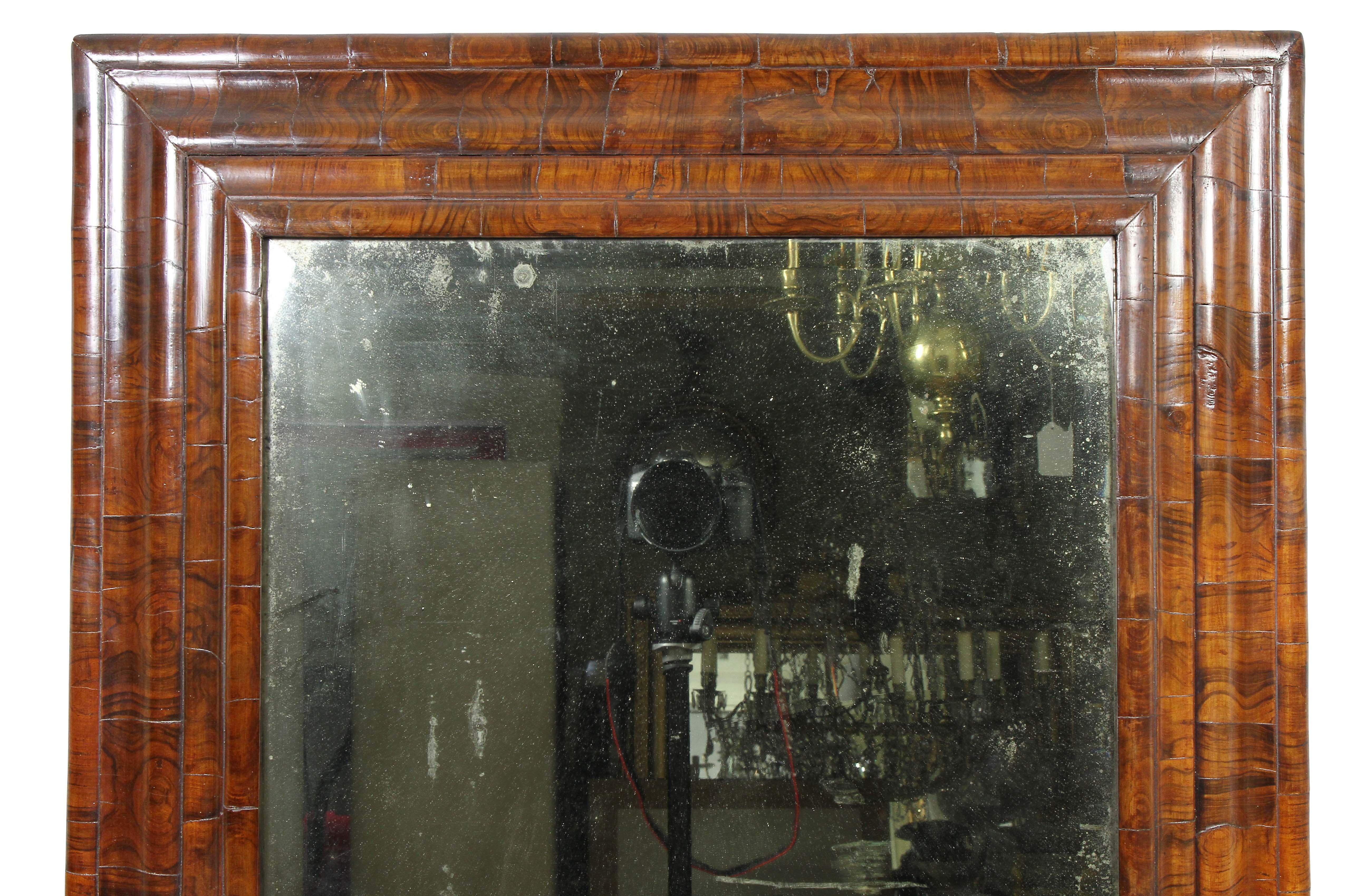 Rectangular with molded frame, early glass.