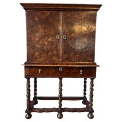 William and Mary Oyster Veneered Cabinet on stand