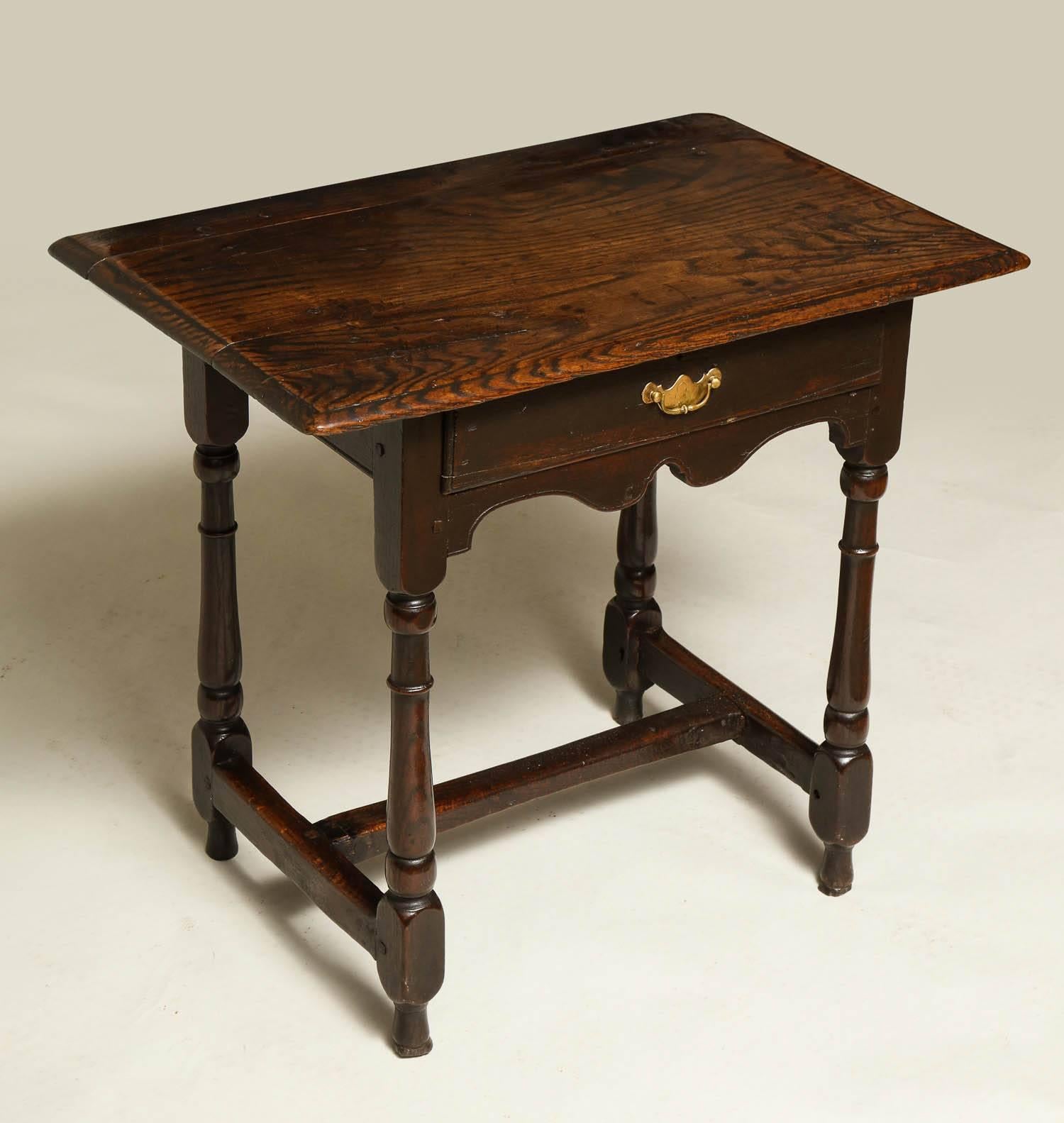 Good English oak single drawer side table, the thumb molded top over single drawer with pleasing 