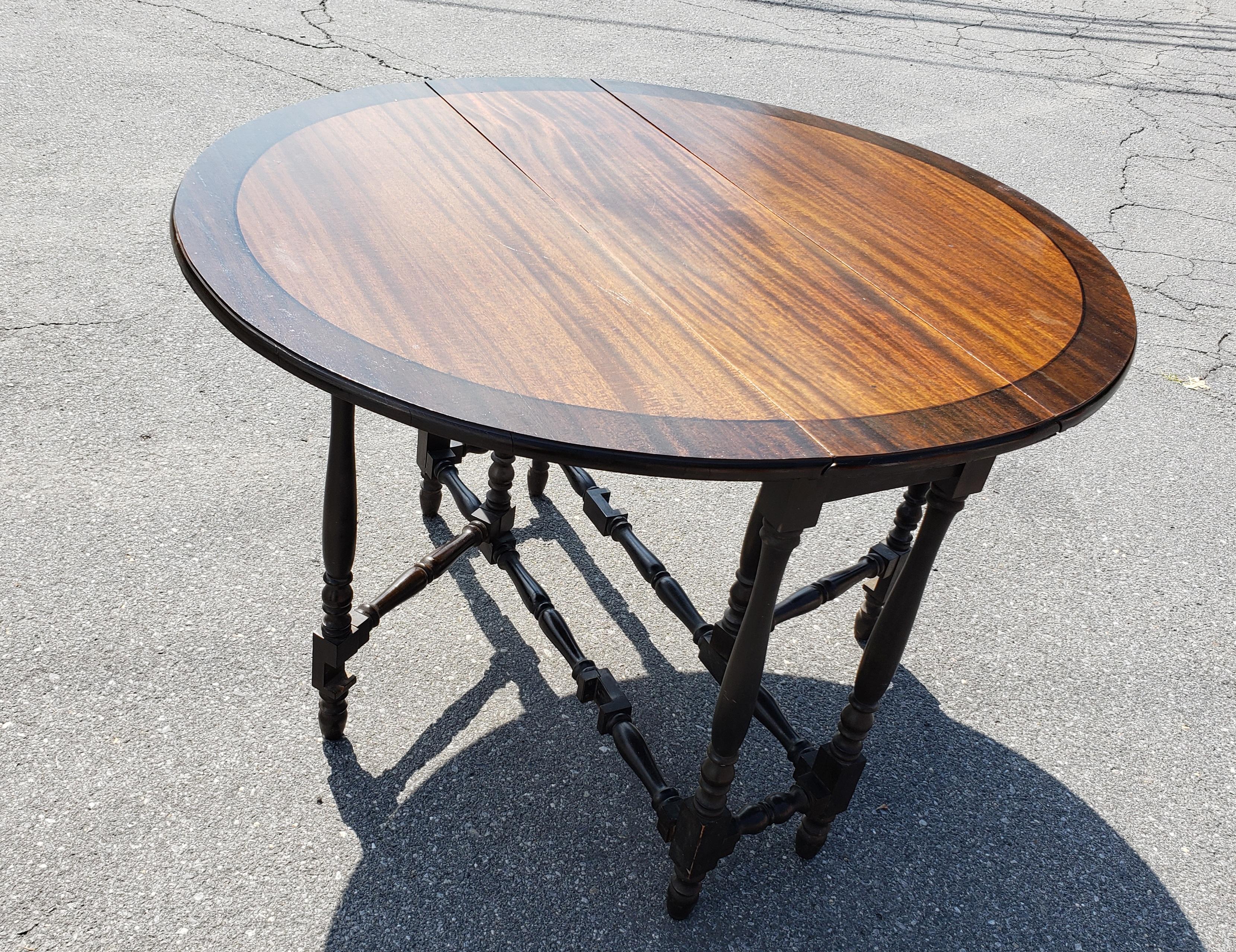 William and Mary William And Mary Style Stained Mahogany Gate Leg Drop Leaf Oval Dining Table  For Sale