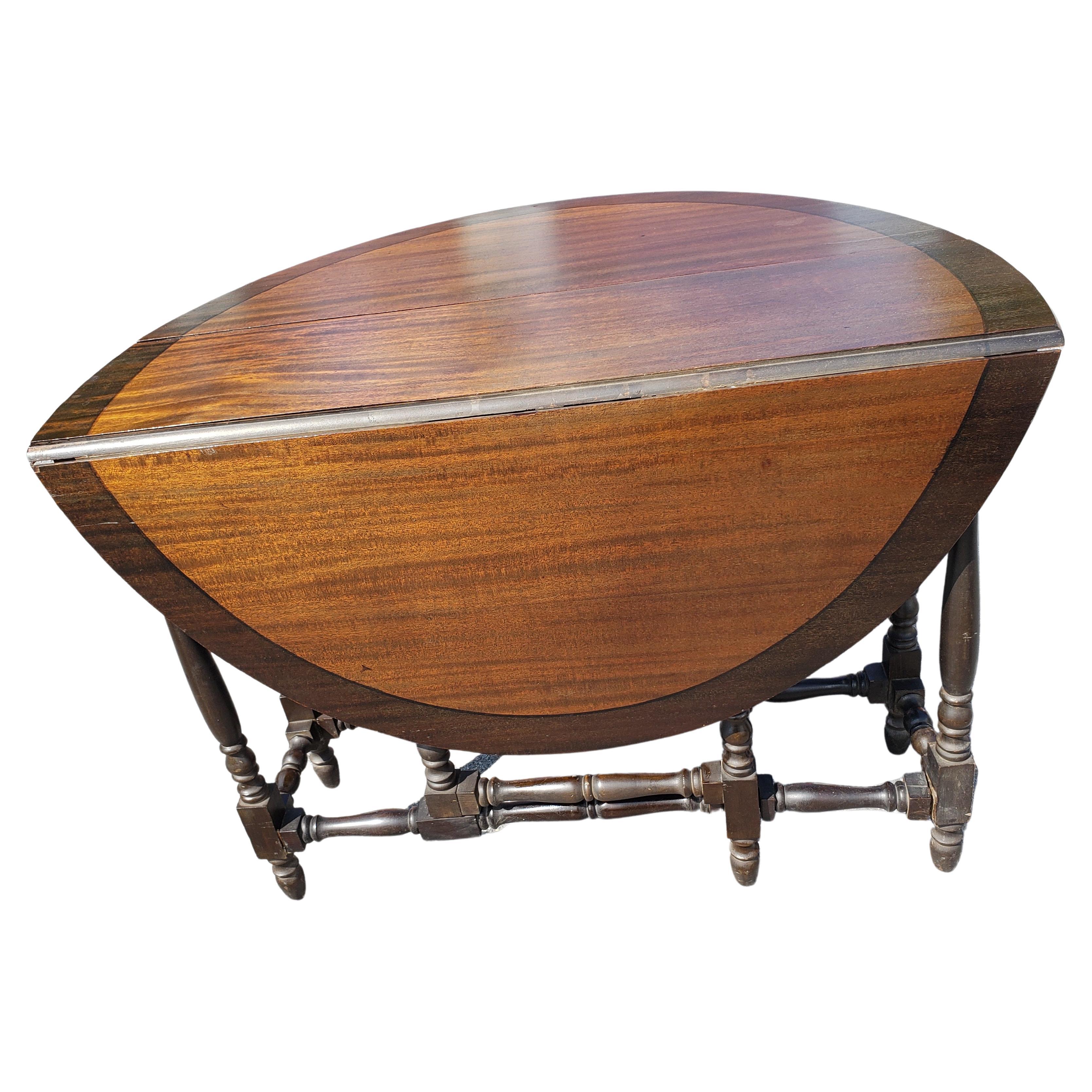 William And Mary Style Stained Mahogany Gate Leg Drop Leaf Oval Dining Table  For Sale