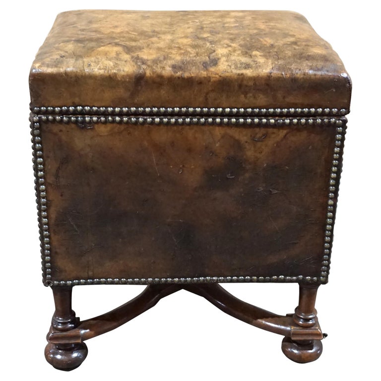 https://a.1stdibscdn.com/william-and-mary-style-walnut-leather-upholstered-small-footstool-with-storage-for-sale/f_8552/f_316411221670476956413/f_31641122_1670476957796_bg_processed.jpg?width=768