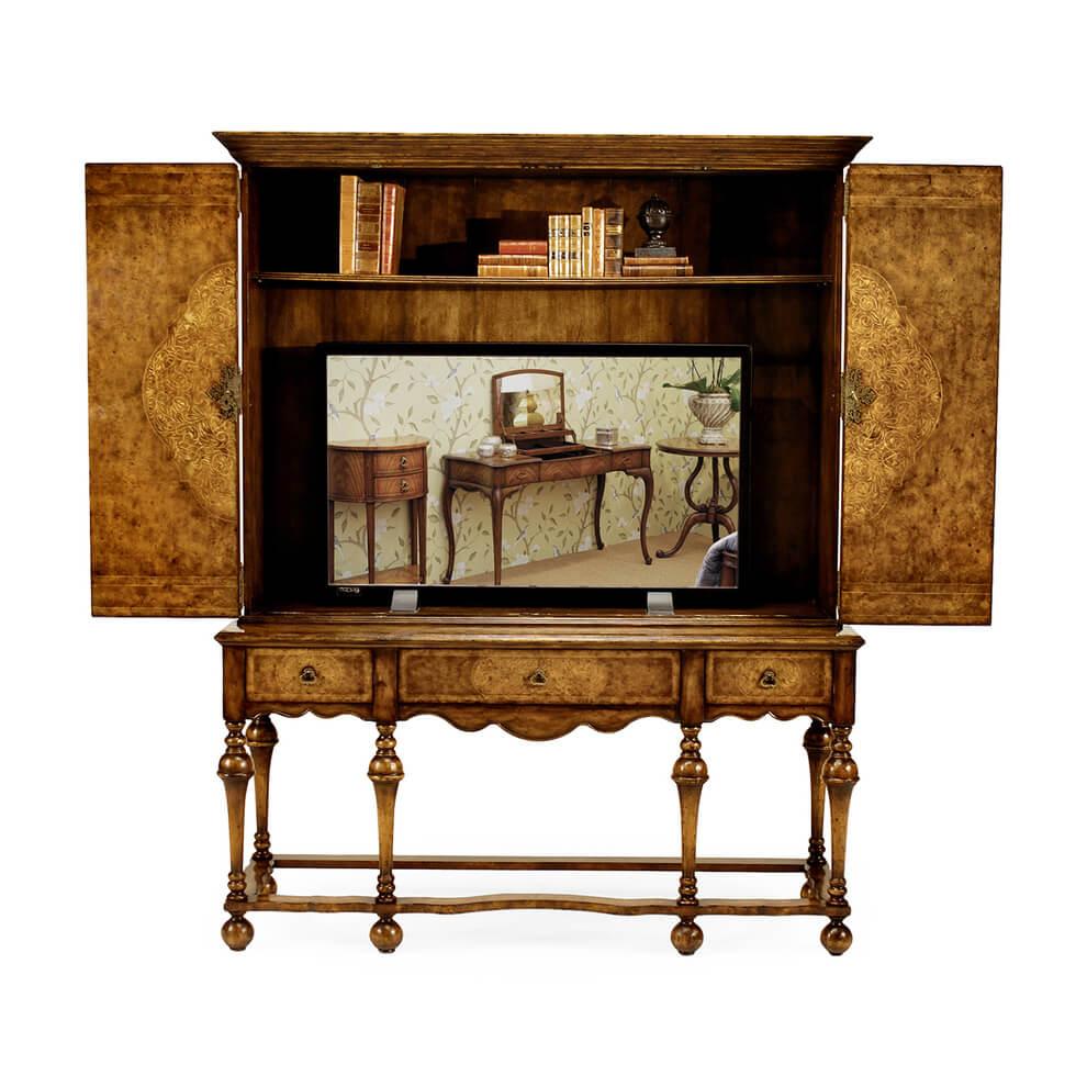 A William and Mary style seaweed marquetry inlaid walnut and burl walnut TV cabinet on an openwork stand, twin hinged doors to the top section with finely inlaid contrasting panels of swirling arabesques, and a space for a TV within, above three