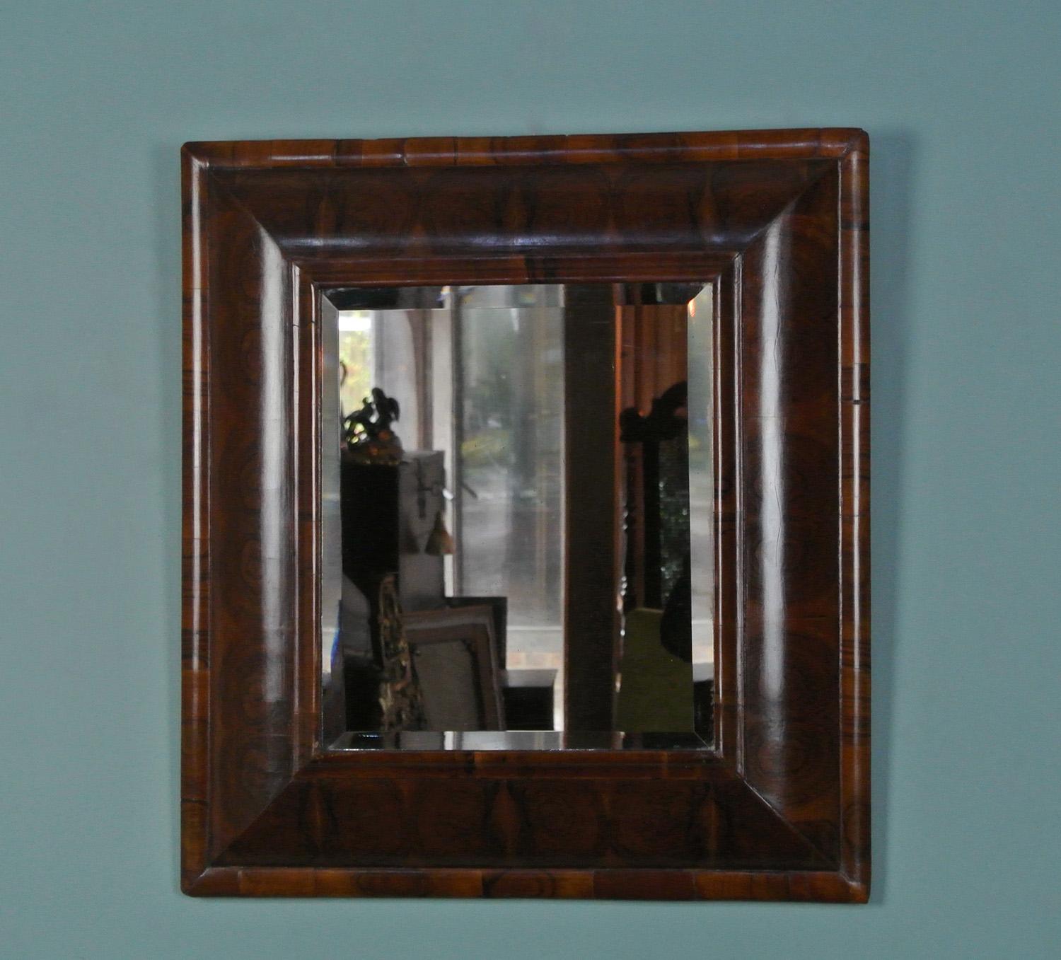 William and Mary Walnut Oyster Veneer Cushion Framed Mirror c. 1690 In Good Condition In Heathfield, GB
