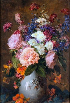 Rosas y crisantemos en un jarrón