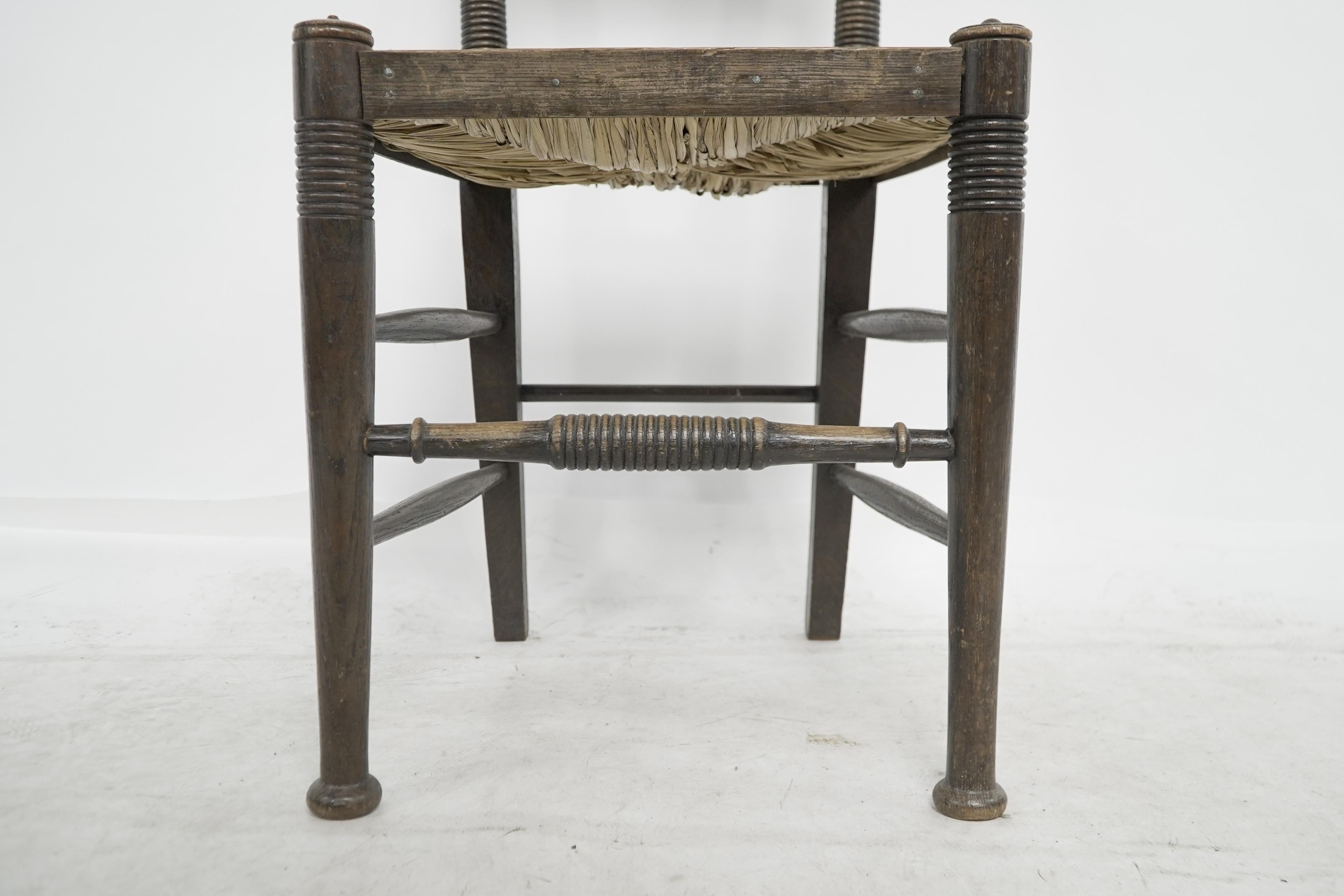 Oak William Birch, retailed by Liberty & Co. Pair of Arts & Crafts oak dining chairs For Sale