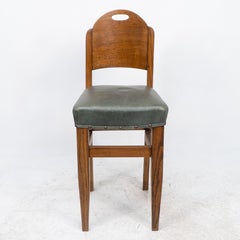 William Birch. An Arts & Crafts high seat music chair with leather seat