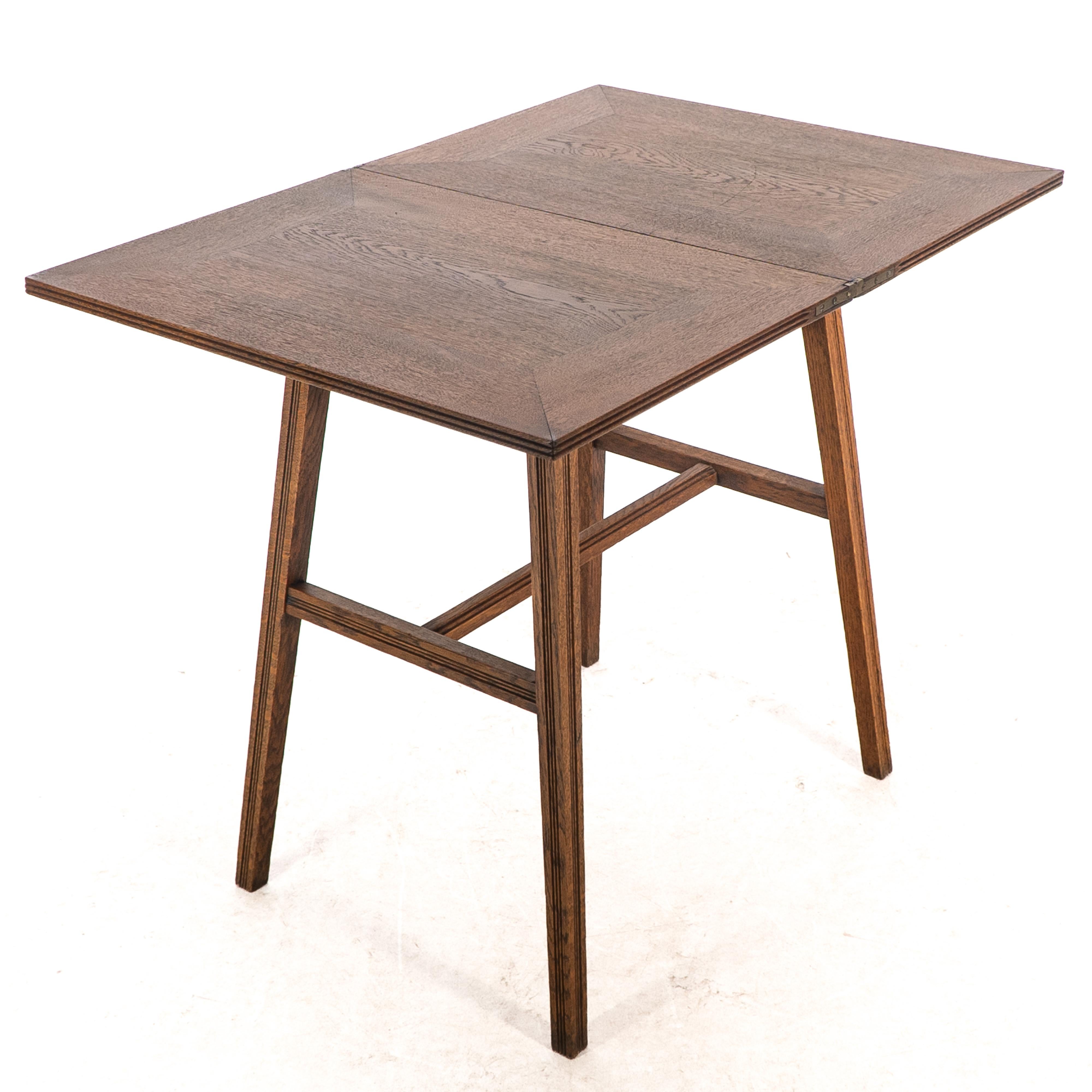 William Birch. Arts & Crafts oak card or game table with a swivel & fold out top For Sale 10