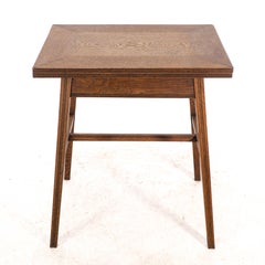 William Birch. Arts & Crafts oak card or game table with a swivel & fold out top