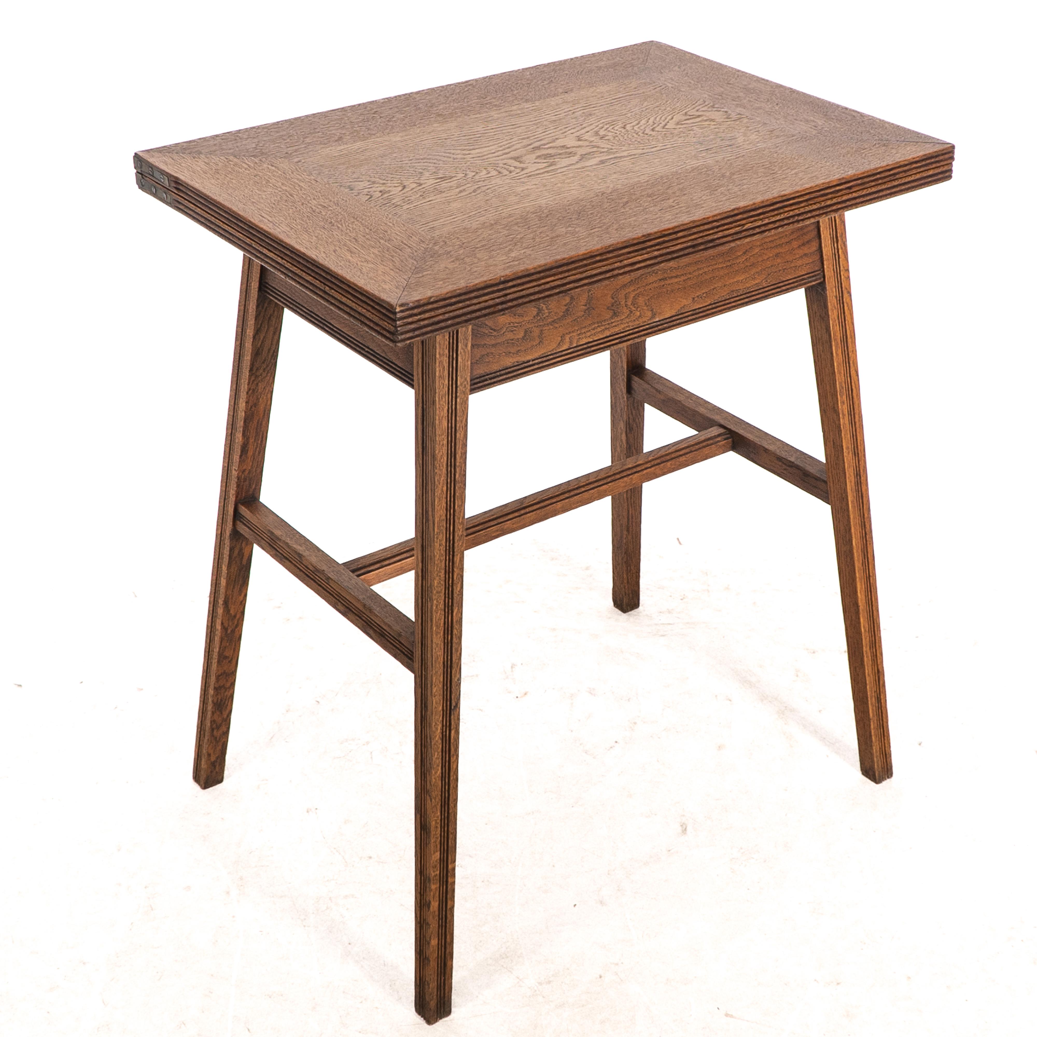 Oak William Birch. Arts & Crafts oak card or game table with a swivel & fold out top For Sale