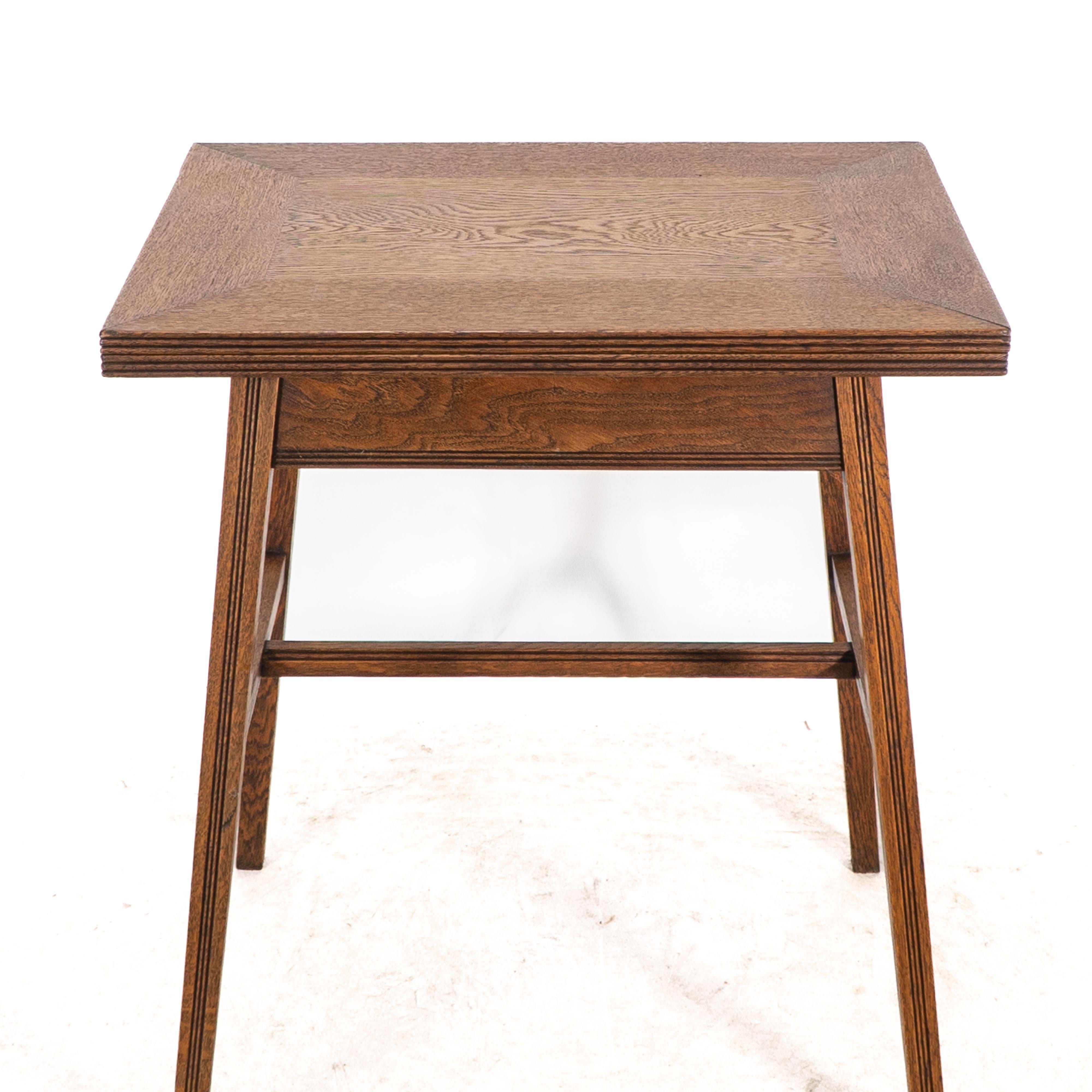 William Birch. Arts & Crafts oak card or game table with a swivel & fold out top For Sale 1