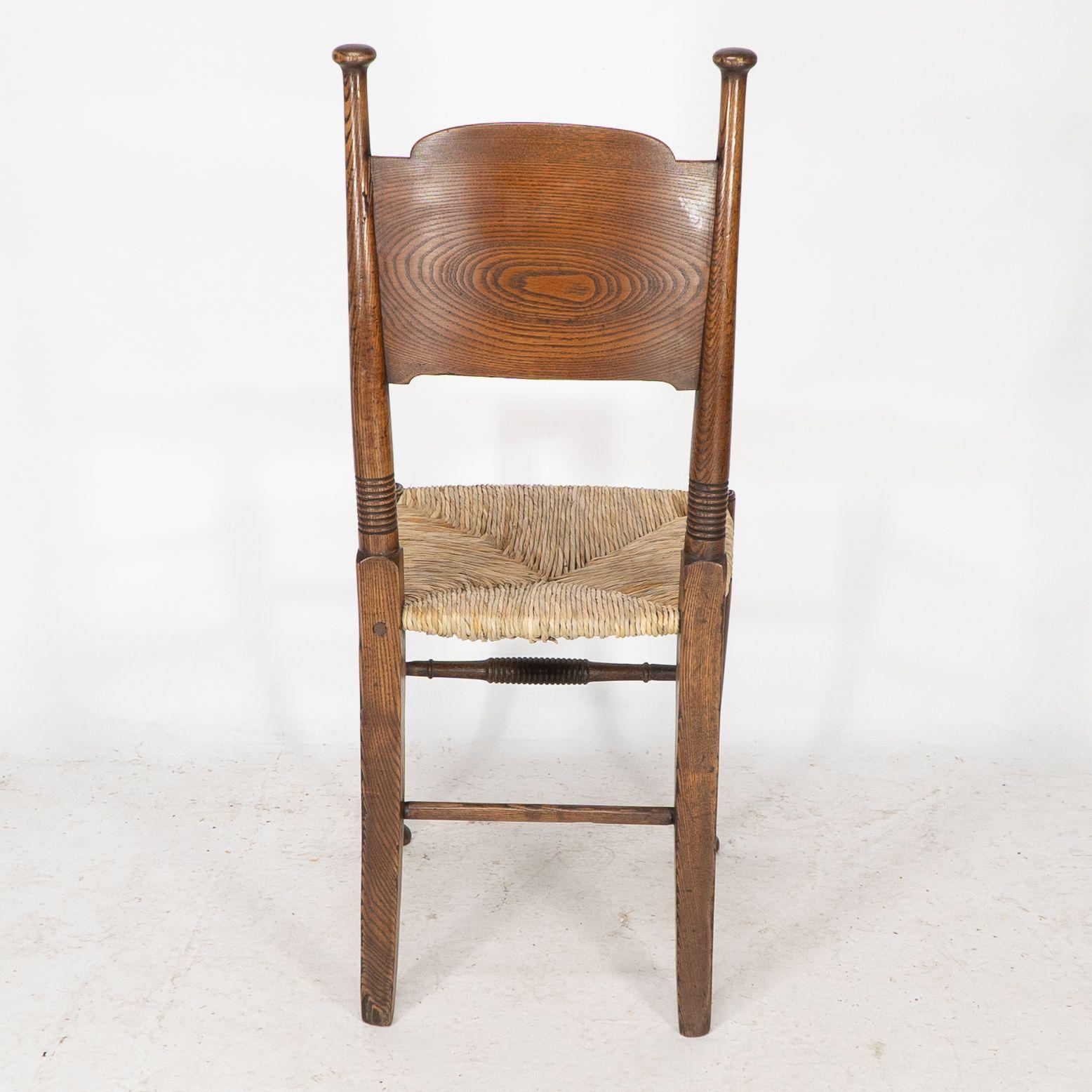 William Birch for Liberty & Co. A pair of Arts & Crafts rush seat oak chairs For Sale 8