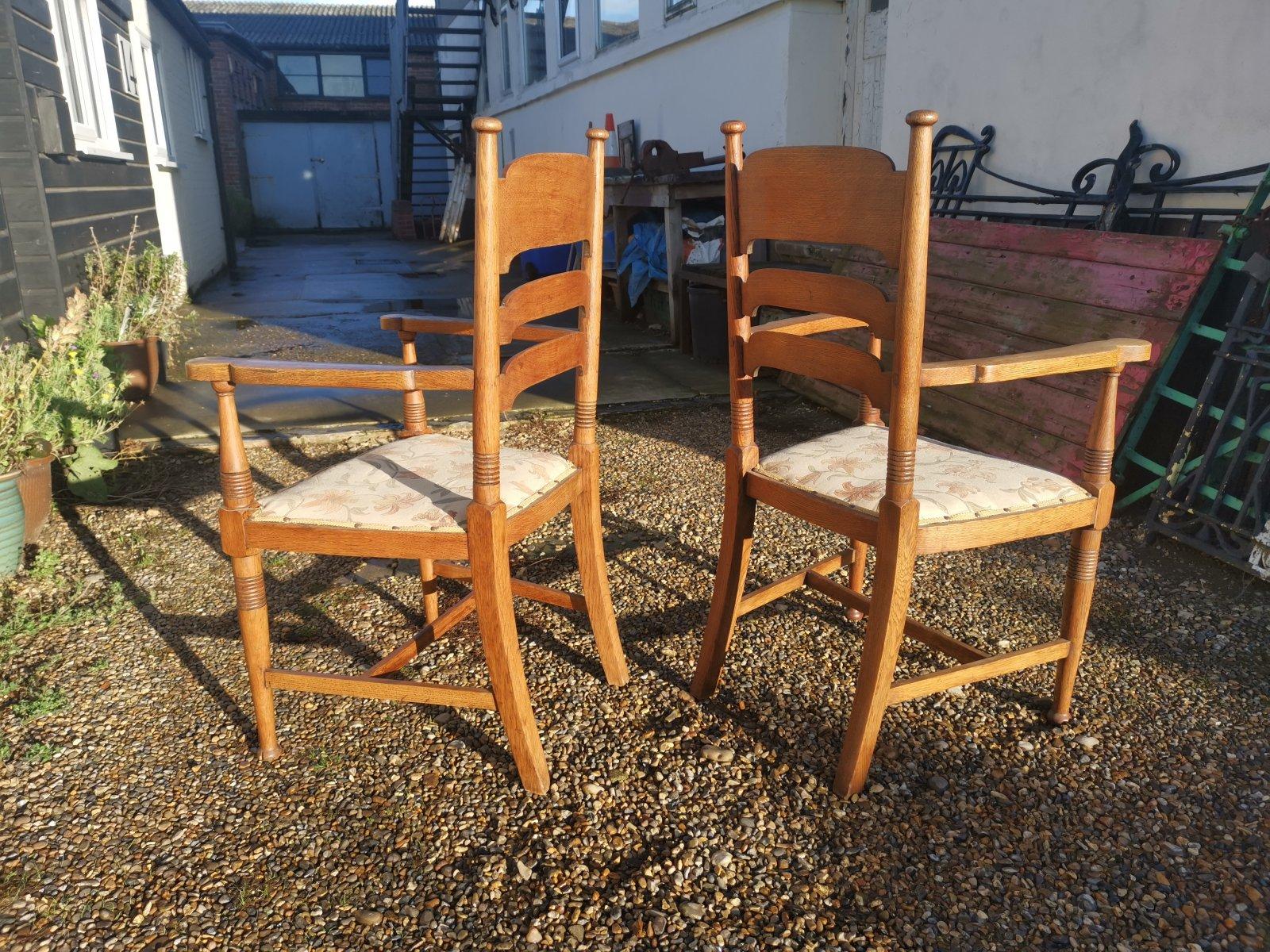 Hand-Crafted William Birch for Liberty & Co. a Set of Sixteen Arts & Crafts Oak Dining Chairs For Sale