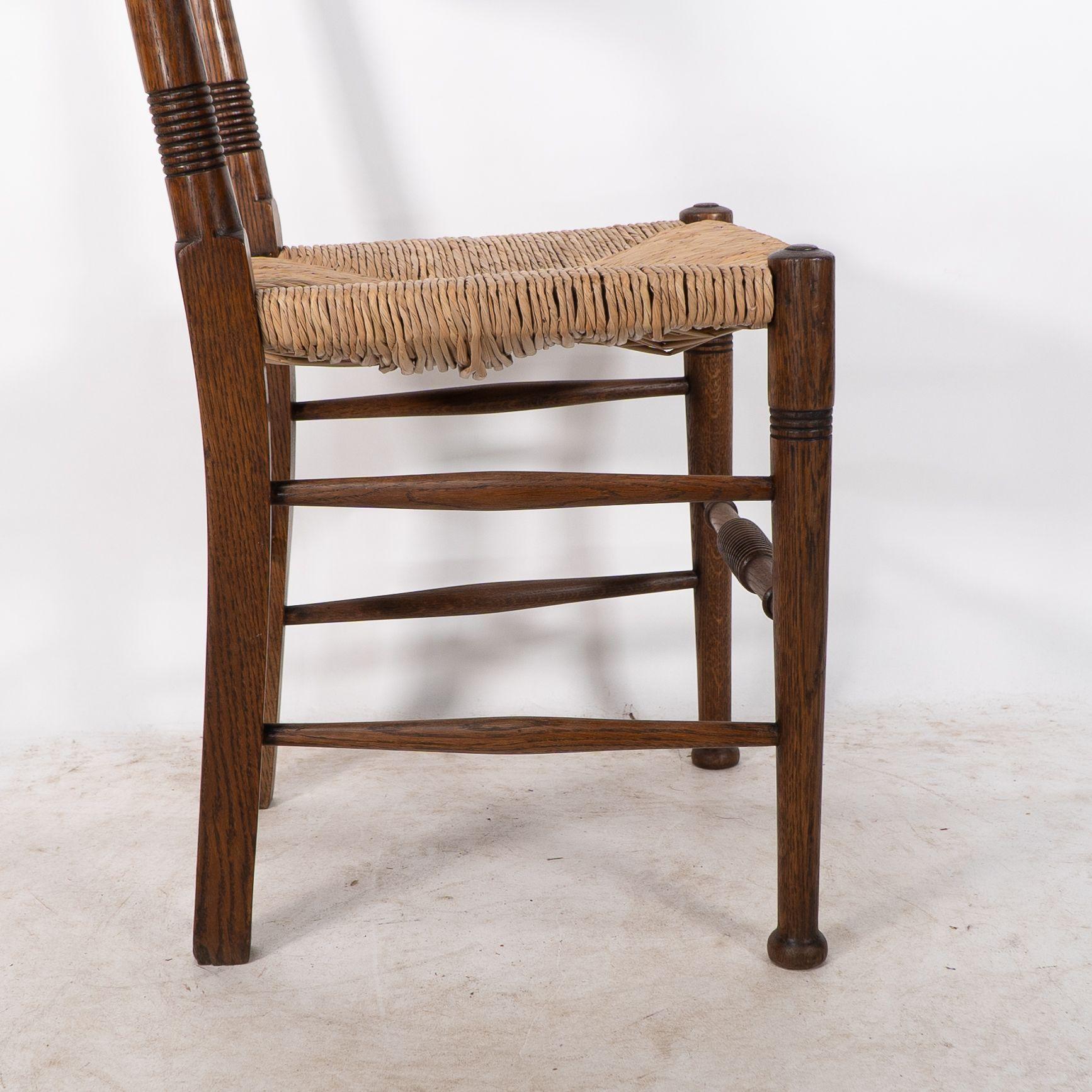 William Birch. Liberty & Co. A Arts and Crafts rush seat oak dining chair For Sale 6