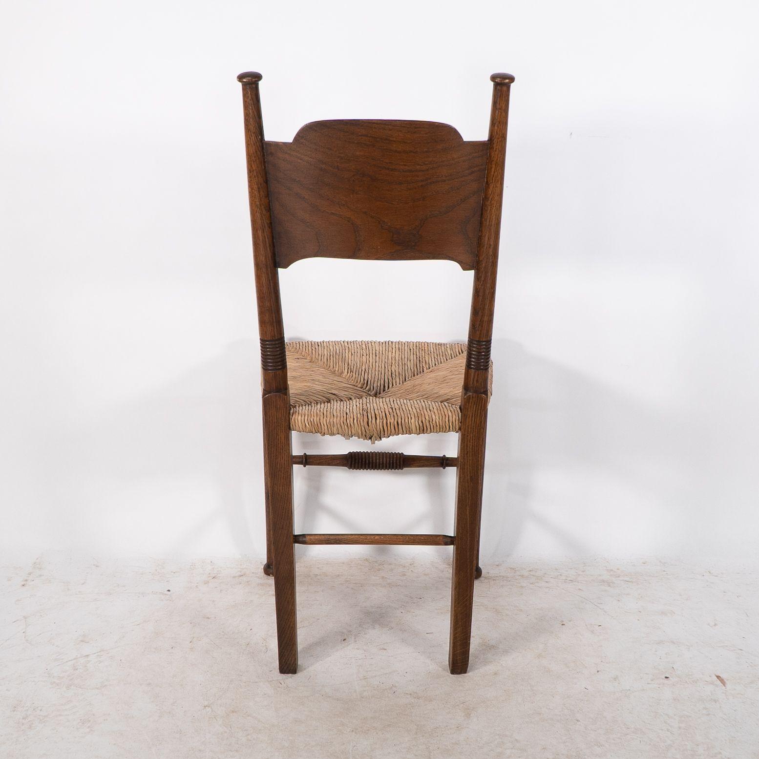 William Birch. Liberty & Co. A Arts and Crafts rush seat oak dining chair For Sale 8