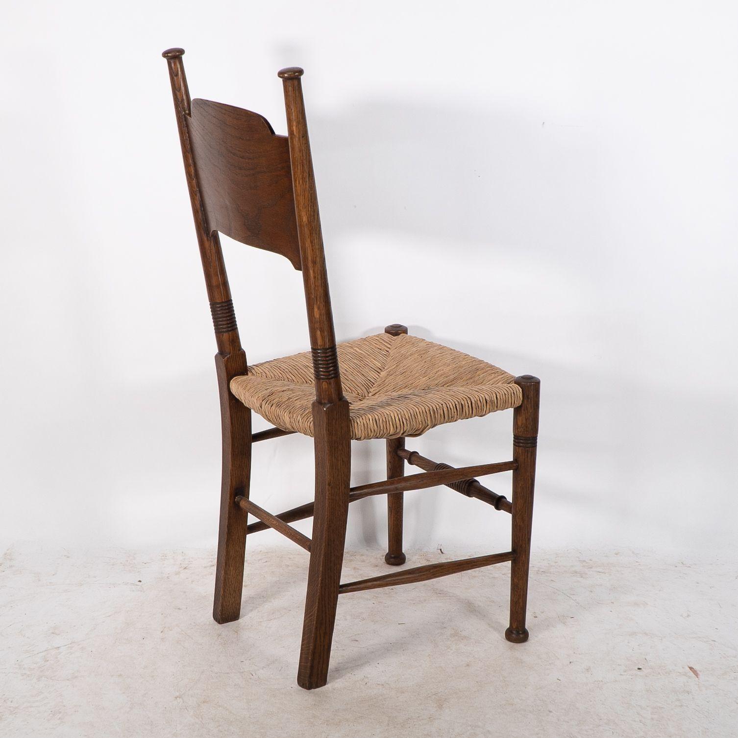 William Birch. Liberty & Co. A Arts and Crafts rush seat oak dining chair For Sale 9