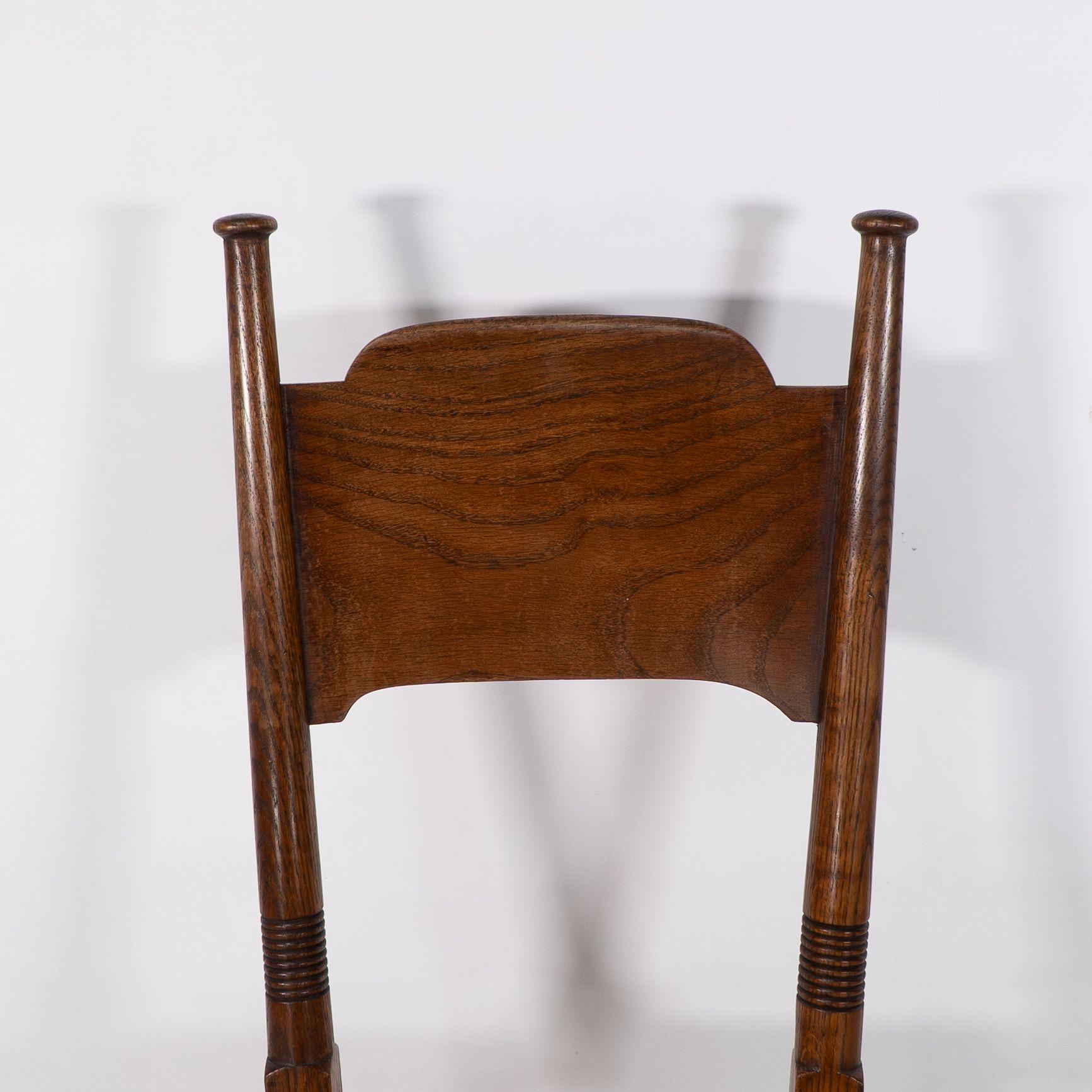 William Birch. Liberty & Co. A Arts and Crafts rush seat oak dining chair For Sale 4