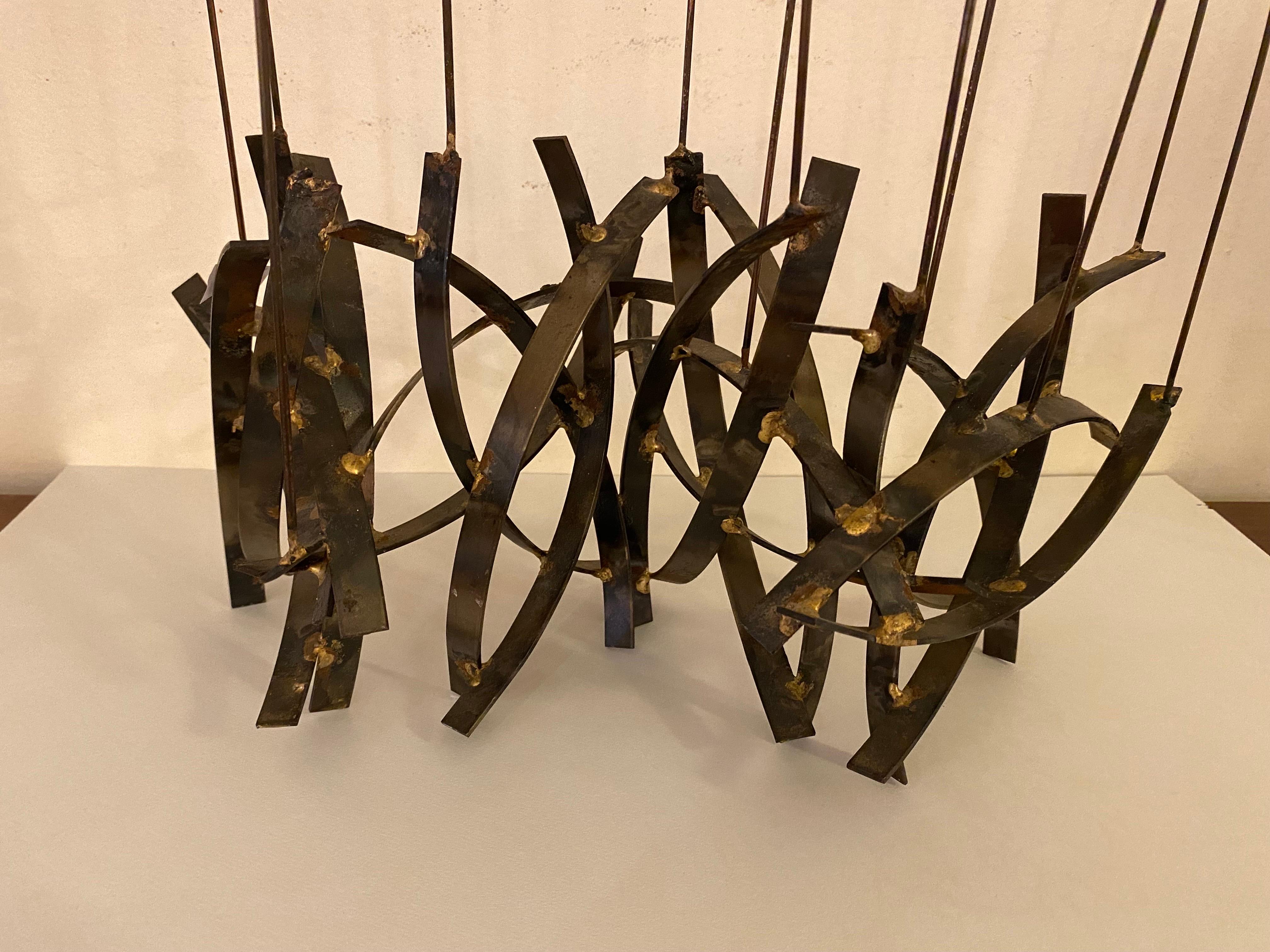 William Bowie table sculpture. Nice Scale and Size! 12 rods attached to the welded base, at the top of each there is a copper egg shaped disc with edges trimmed out with spot welds. nice movement when nudged!