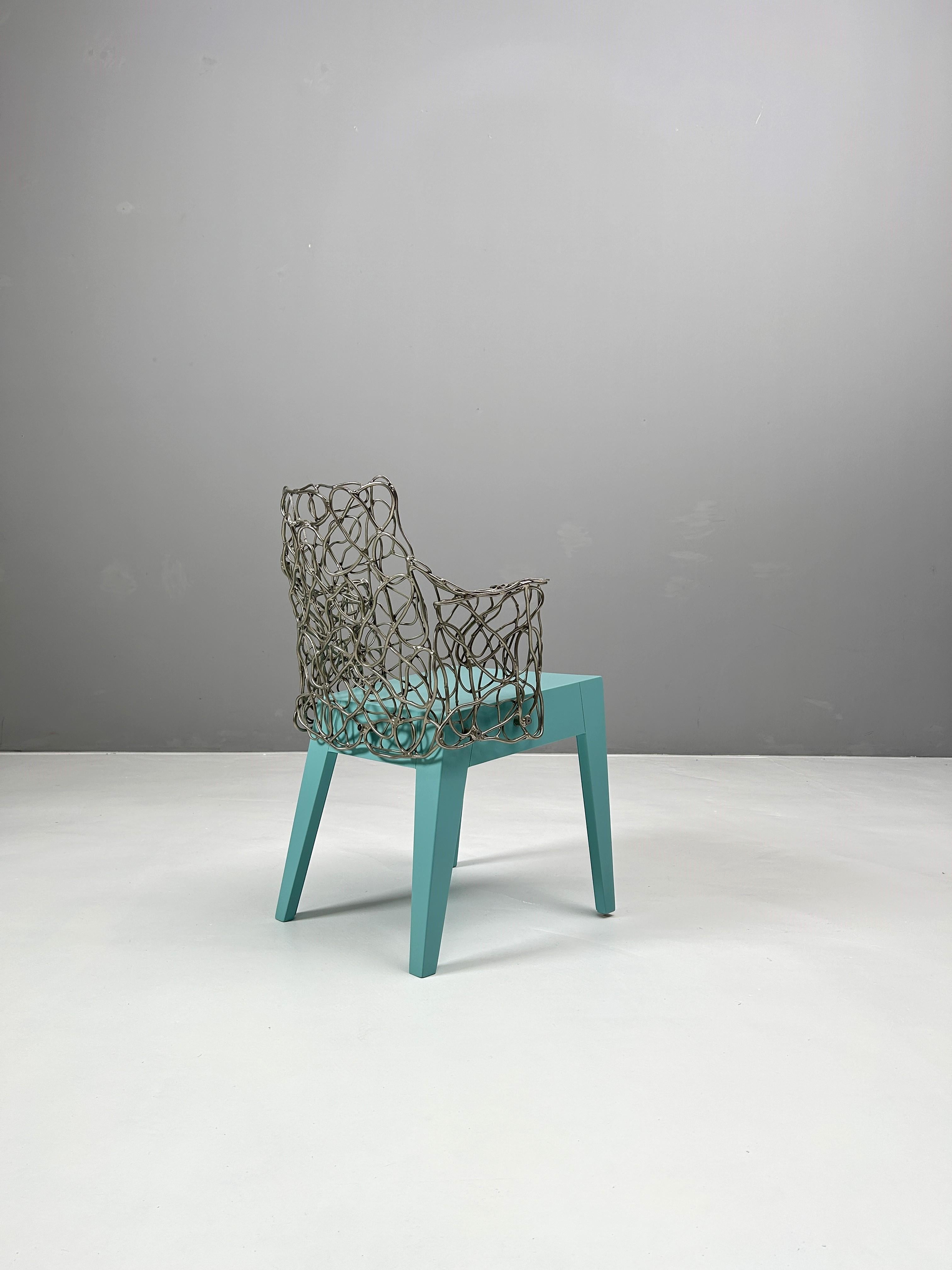 The chair by William Brand and Annet van Egmond is an imaginative design of an armchair that is strongly connected to their early lamp designs.

The design of the 