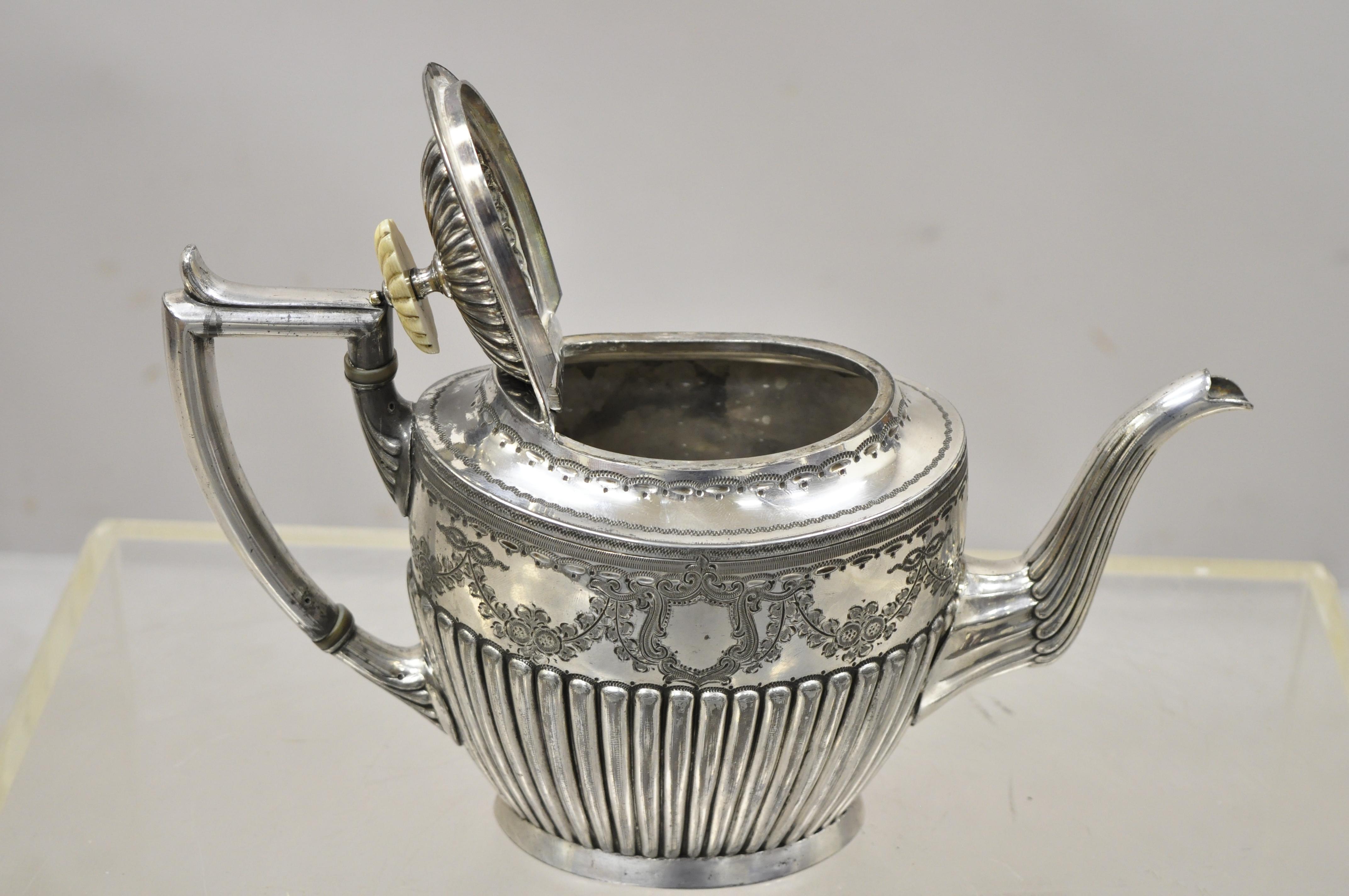 Antique William Briggs & Co Sheffield Edwardian Victorian silver plated tea coffee pot (A). Item features bone handle to lid, floral drape and shield pattern, chased form, marked to bottom 
