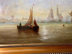 English 19th century Antique oil of fishing boats at rest with a Sunset,