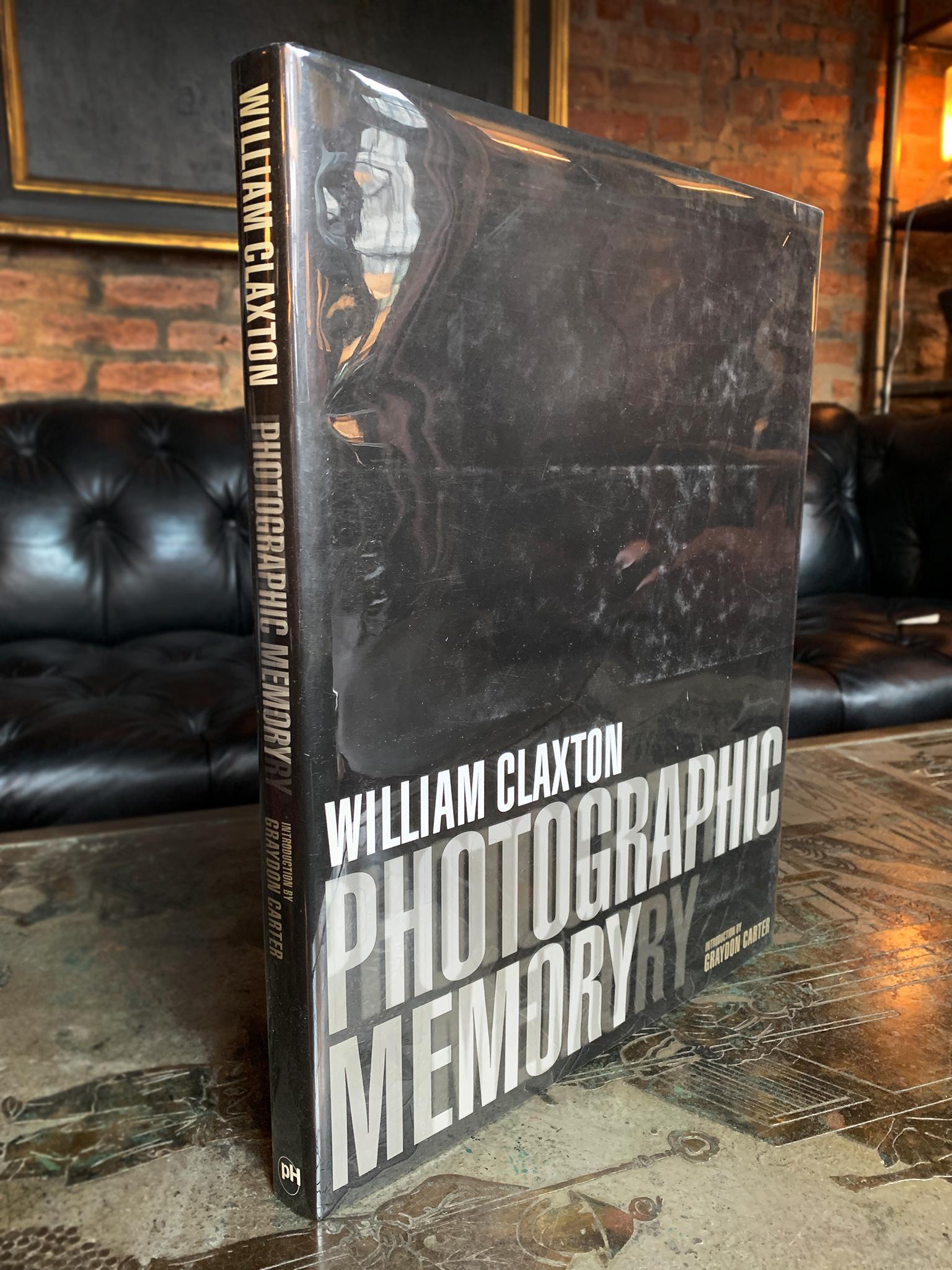 1st edition of William Claxton's monograph Photographic Memory. The book collects Claxton's portraits of iconic writers, musicians, actors, and celebrities. The 115 duotone photos emerge from intimate moments the photographer spent with these