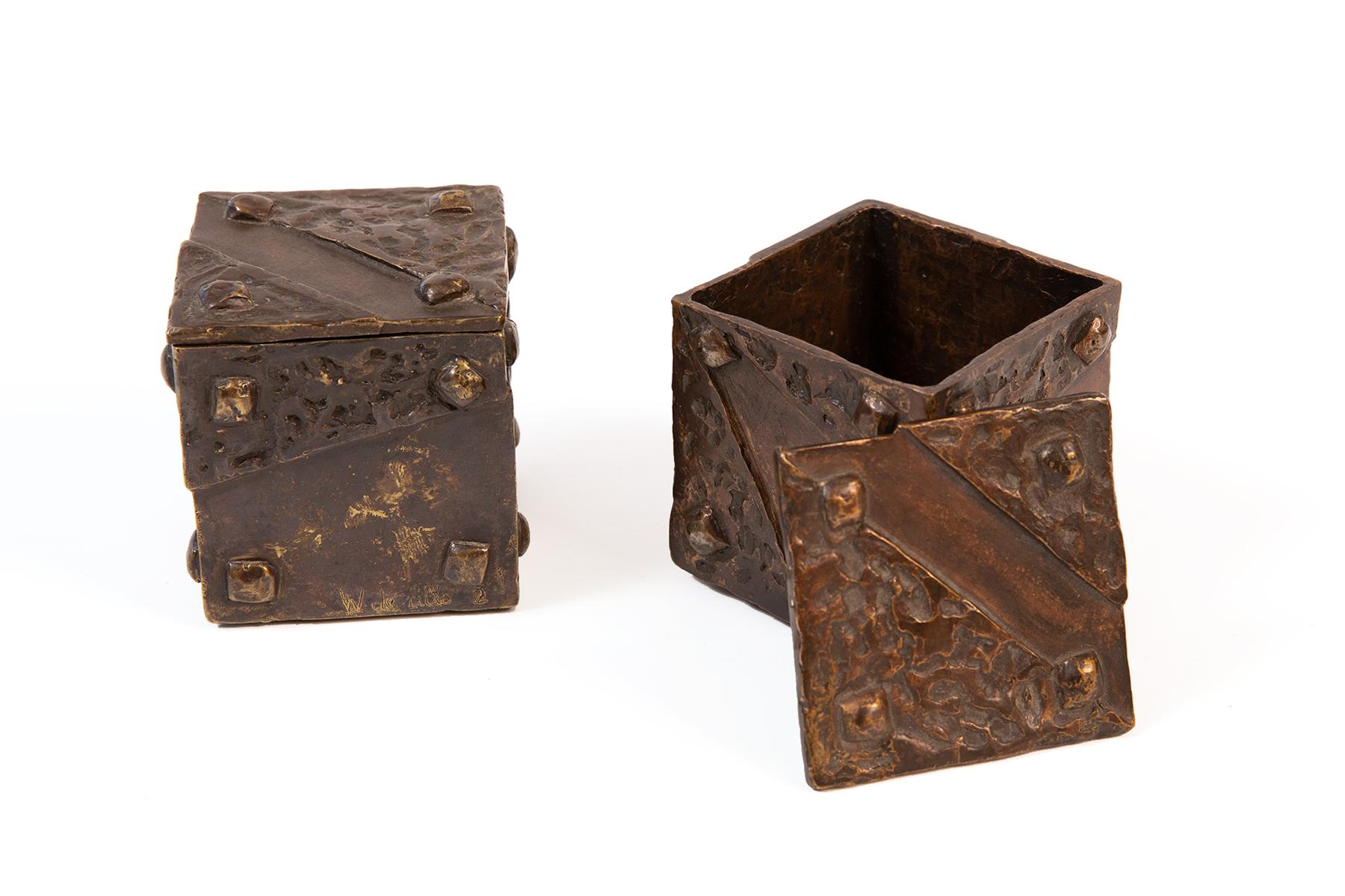 Three bronze Brutalist style sculptural boxes by William De Lillo from the 1970s.
The jeweler and artist, William De Lillo worked with Harry Winston, Cartier New York and most famously as Jean Schlumberger’s assistant at Tiffany & Co. Mr. de Lillo