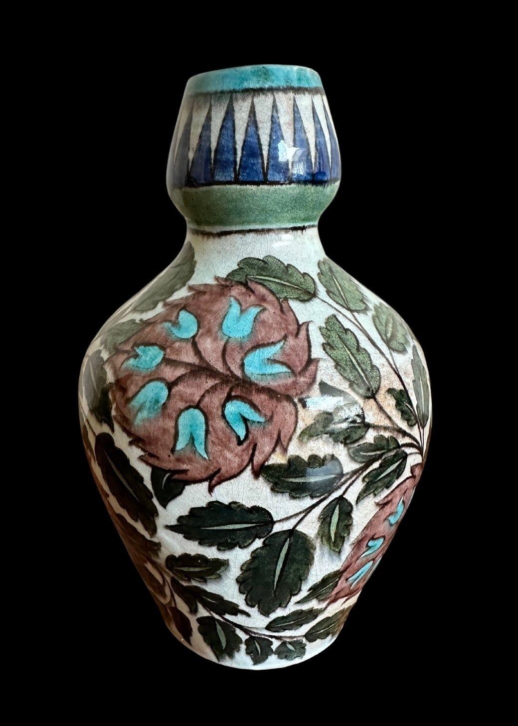 5389
William De Morgan Polychrome Jug decorated with Flowers and Foliage in the Persian Palate
Invisible restoration to cracks
23.5cm high
circa 1890.