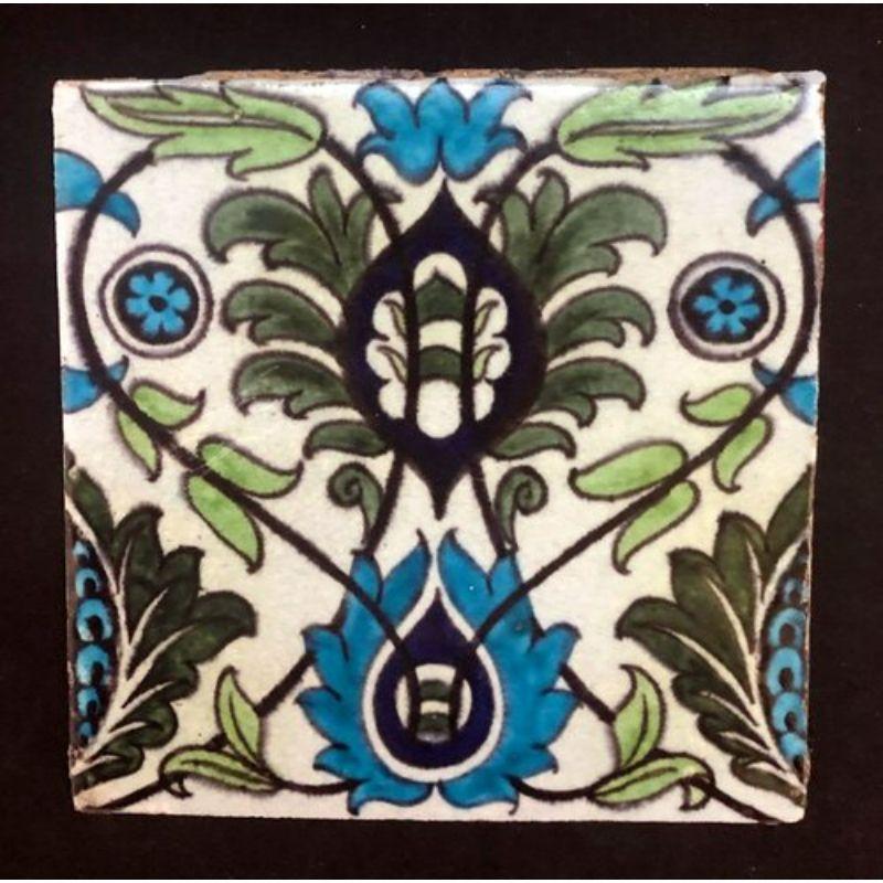 One of 5 William De Morgan Tiles decorated with Persian foliage Remnants of plaster and minor glaze frits Circa 1888

Dimensions: 6