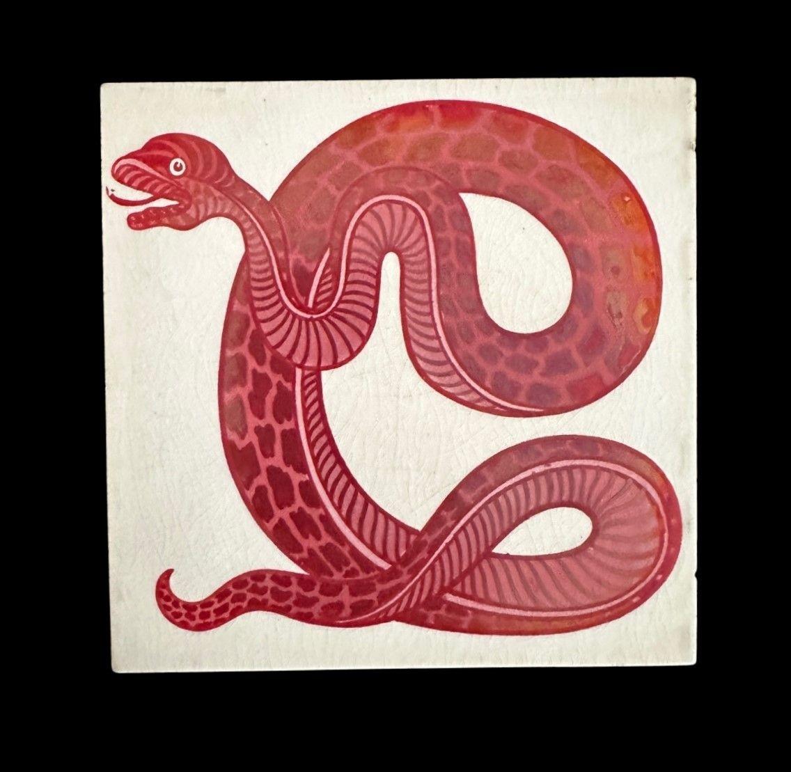 5448
Scarce Ruby Lustre Tile crisply decorated with a Snake with a protruding tongue and a strong firing
1888 - 97
15.2cm x 15.2cm x 1cm