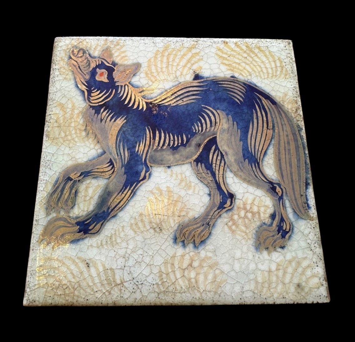5514
William De Morgan Tripple Lustre Tile decorated with a “Howling Wolf” design
15.3cm x 15.5cm
1898
Provenance:
Purchased by the Earl of Balfor (UK Prime Minister 1902 - 1905) directly from William De Morgan, thence by descent
Light scratches