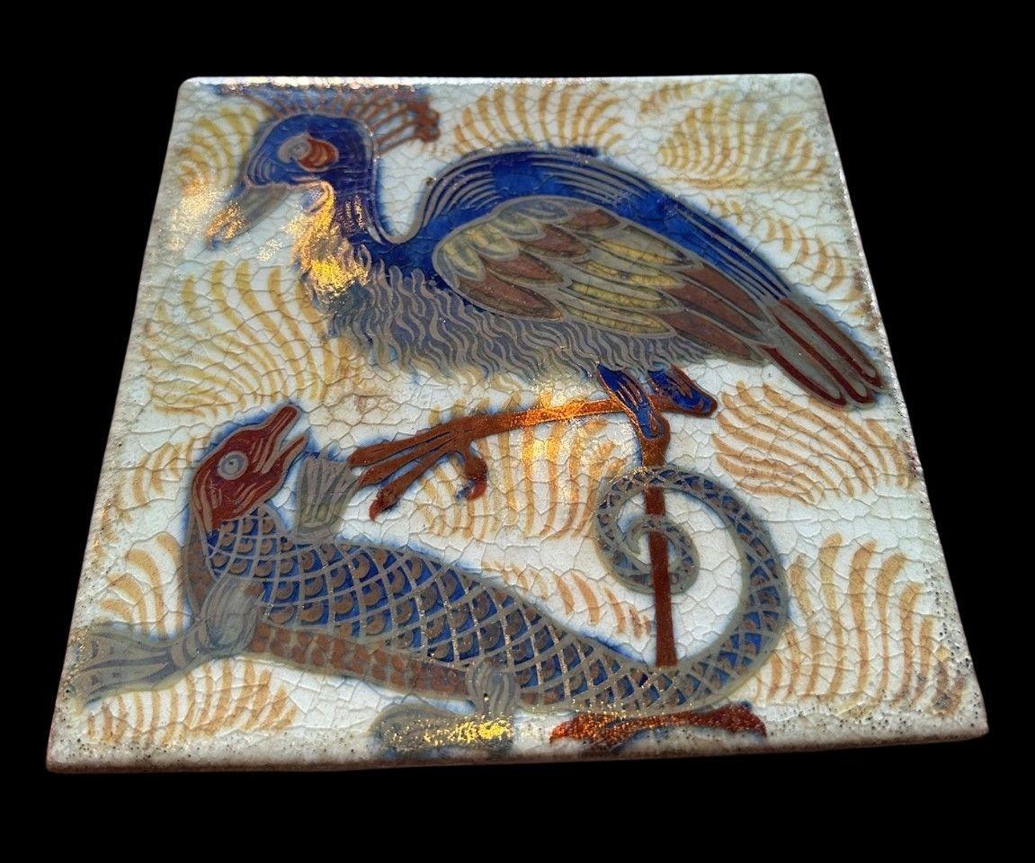 5517
William De Morgan Triple Lustre Tile decorated with “Bird and Lizard” design
15.3cm x 15.3cm
1898
Provenance:
Purchased by the Earl of Balfor (UK Prime Minister 1902 - 1905) directly from William De Morgan, thence by descent
Light pitting to