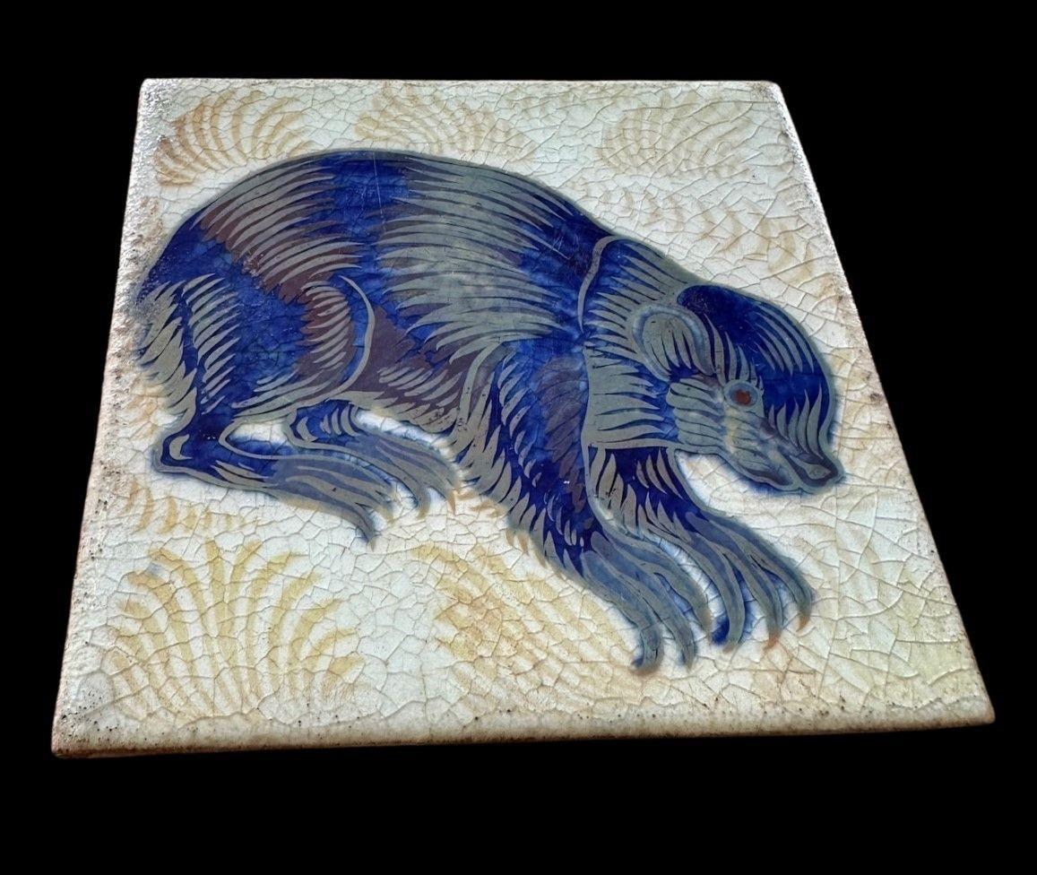 5521
William De Morgan Triple Lustre Tile decprated with the “Marmot” design
15.3cm x 15.8cm
1898
Provenance:
Purchased by the Earl of Balfor (UK Prime Minister 1902 - 1905) directly from William De Morgan, thence by descent
Light scratches