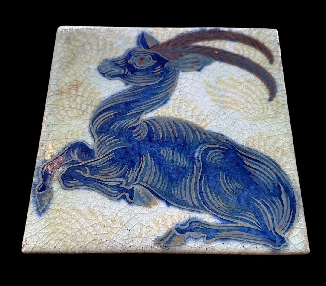 5520
William De Morgan Triple Lustre Tile decorated in the “Seated Antelope” design
15.3cm x 15.5cm
1898
Provenance:
Purchased by the Earl of Balfor (UK Prime Minister 1902 - 1905) directly from William De Morgan, thence by descent