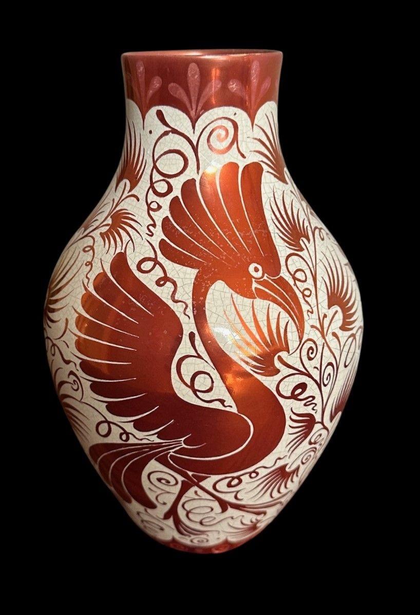 5478
William De Morgan Vase in a ruby lustre glaze decorated with three stylised Peacocks by Joe Juster
23 cm high
Circa 1880s
Typical Crazing