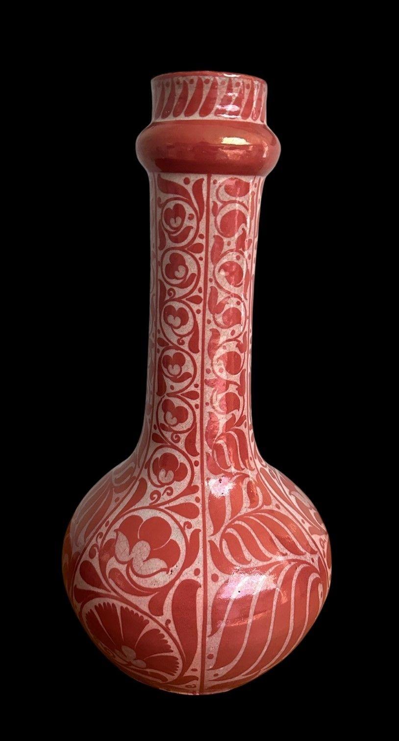 5482
William De Morgan Ruby Lustre Vase decorated with Carnations and scrolling flowers and foliage
See Greenwoon “The Designs of William De Morgan” Pg 205 for similar examples
35 cm high, 18cm wide
Circa 1880