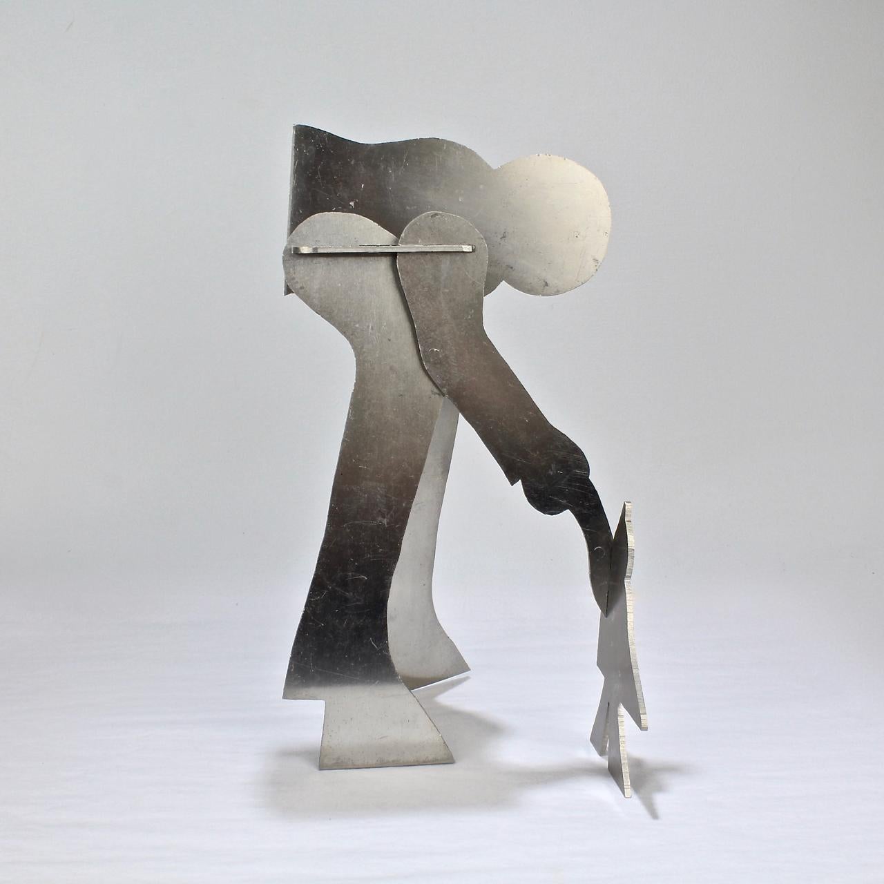 Américain Sculpture de puzzle moderniste en aluminium de William Dickey King représentant un homme avec un oiseau en vente