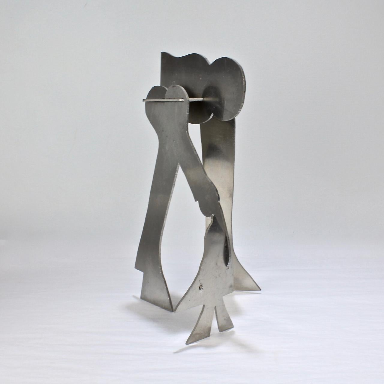 Mid-Century Modern William Dickey King Modernist Aluminum Puzzle Sculpture of a Man with Bird For Sale