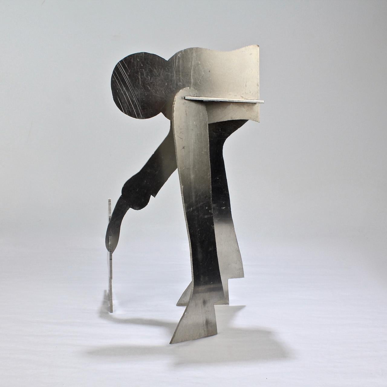 American William Dickey King Modernist Aluminum Puzzle Sculpture of a Man with Bird For Sale