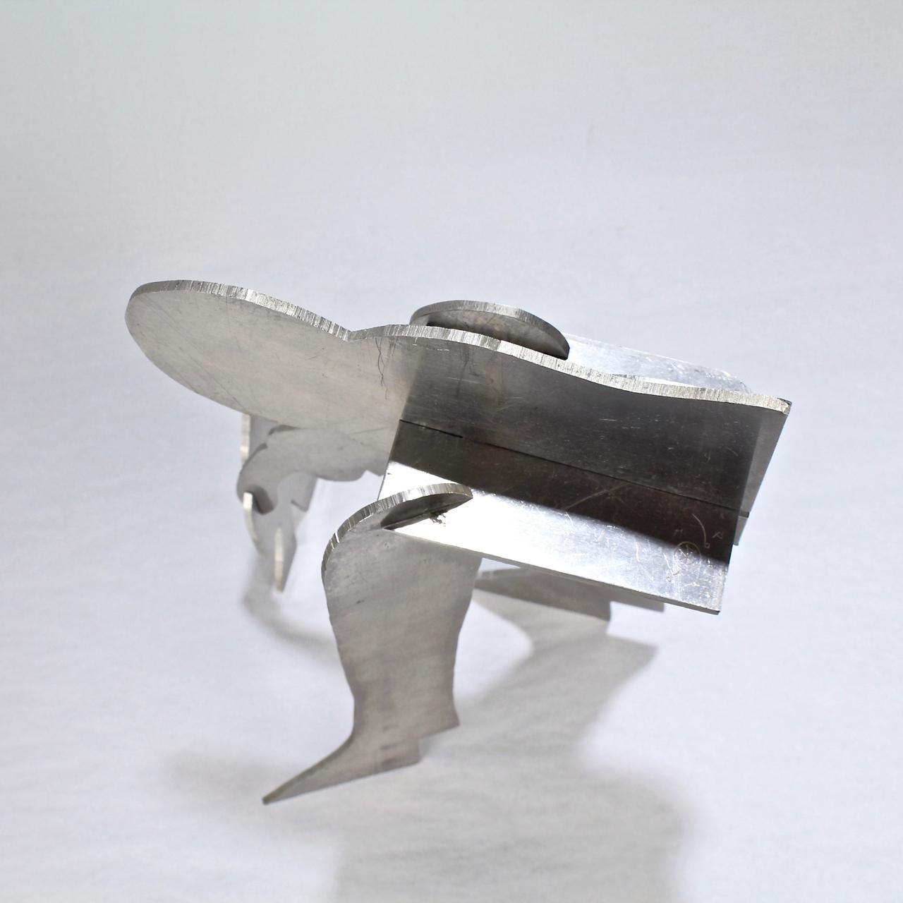 20th Century William Dickey King Modernist Aluminum Puzzle Sculpture of a Man with Bird For Sale