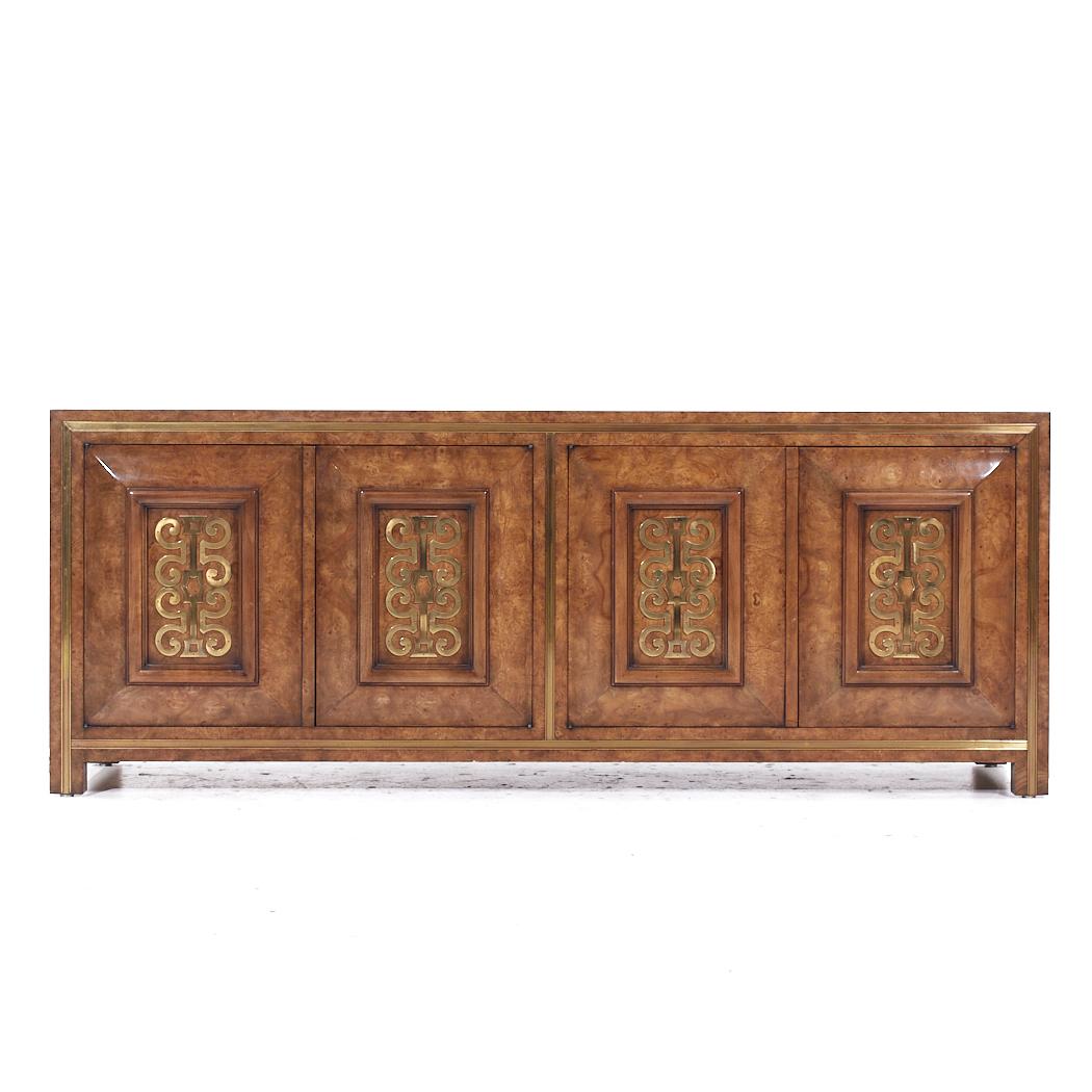 William Doezema for Mastercraft Mid Century Burlwood and Brass Credenza

This credenza measures: 78 wide x 19 deep x 30.25 inches high

All pieces of furniture can be had in what we call restored vintage condition. That means the piece is restored