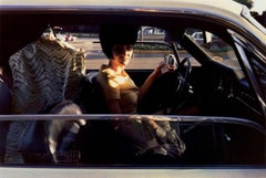 Untitled (Woman in Car with Drycleaning)