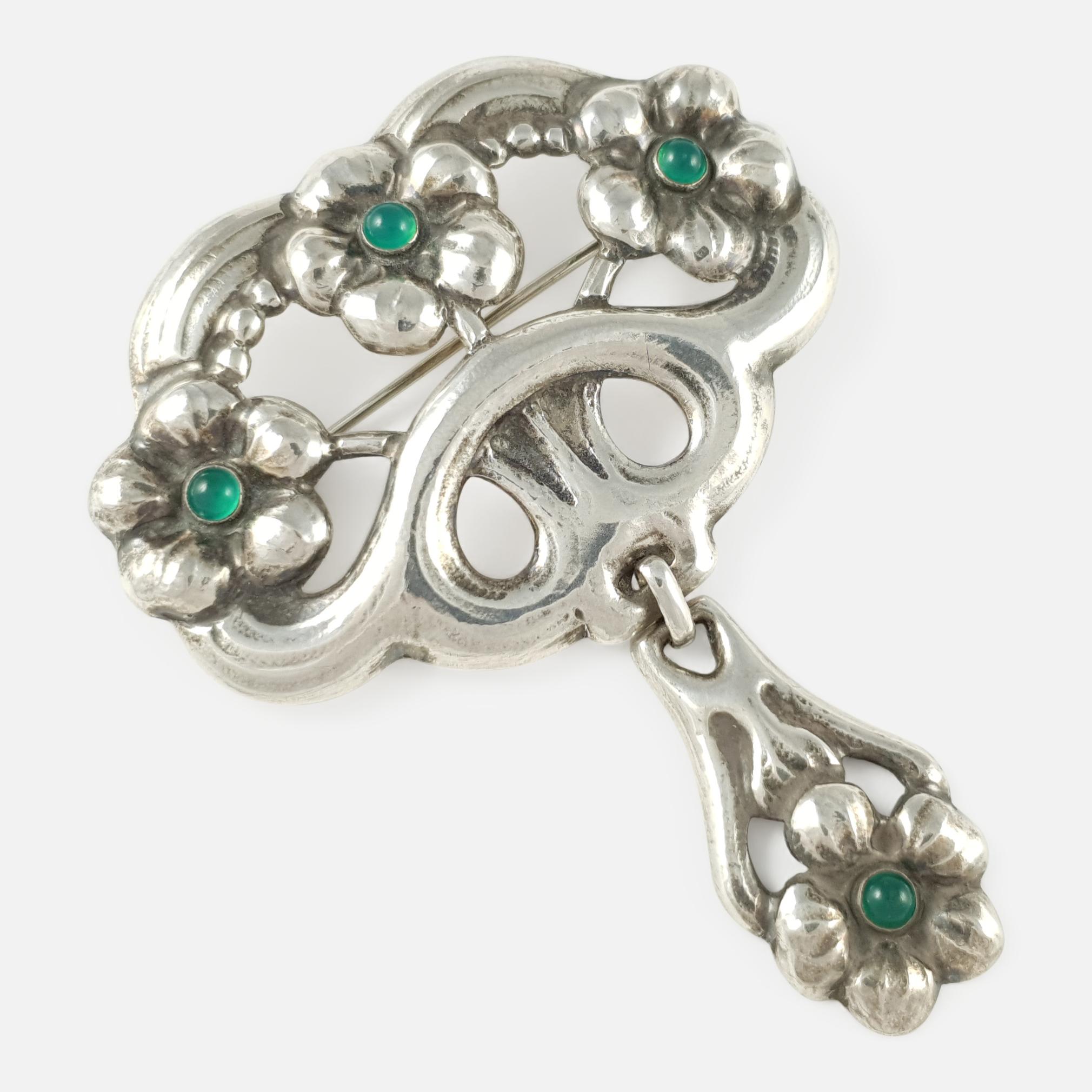 An antique Danish Skønvirke silver & green cabochon cut chrysoprase brooch by William Fuglede - circa 1915. The brooch is stamped with the makers mark 'WmF', & '830'. William Fuglede was a well known maker of Skønvirke (Danish Arts & Crafts