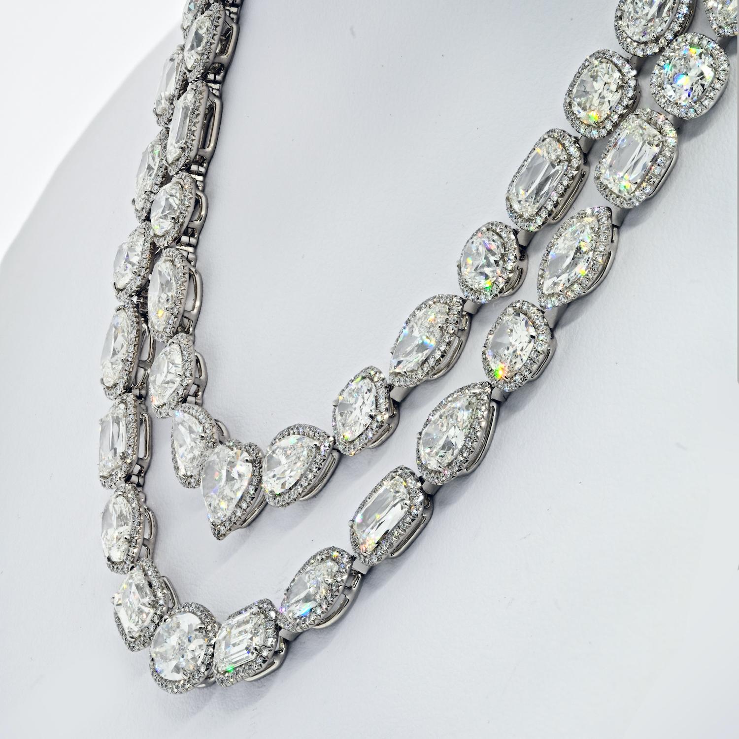 A beautiful example of how fancy shapes can really create a statement piece of jewelry is this diamond necklace by William Goldberg. Designed as a two-row swag of Ashoka [brand name for a round-cornered rectangular modified-brilliant cut], cushion,