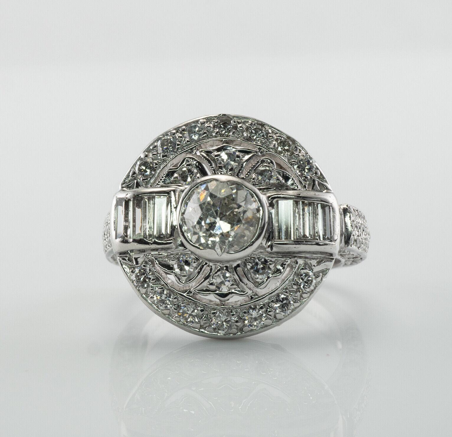 William Goldberg Diamond Ring Vintage Platinum 2.83 TDW

This vintage ring is made by William Goldberg, numbered with R 5806, and stamped Platinum 950. The center Old European cut diamond is .91 carat of I1 clarity and I color. It has a tiny chip on