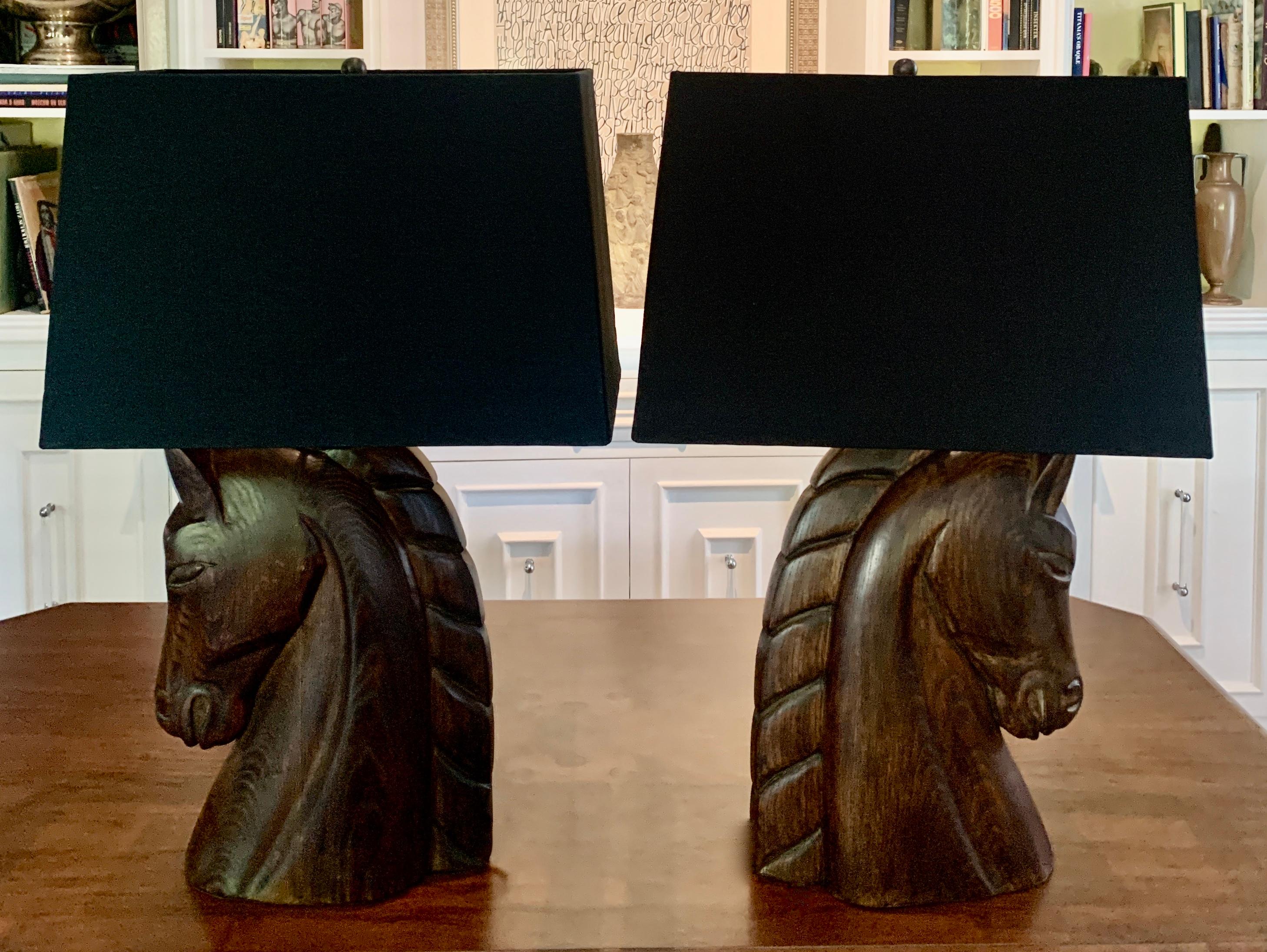Pair of William Billy Haines carved horse head lamps, a stunning pair for the modern or traditional home and especially those who enjoy equestrian - a bold statement.

Firmly attributed pair in dark cerused oak finish with black silk shades
