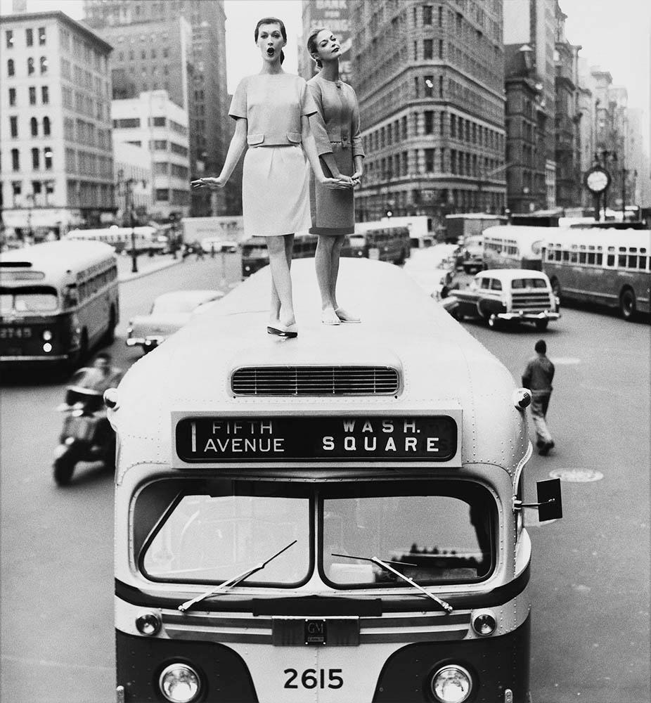 Bus Top: Dovima and Jean Patchett, Madison Square, Harper's Bazaar, 1958 - Photograph by William Helburn