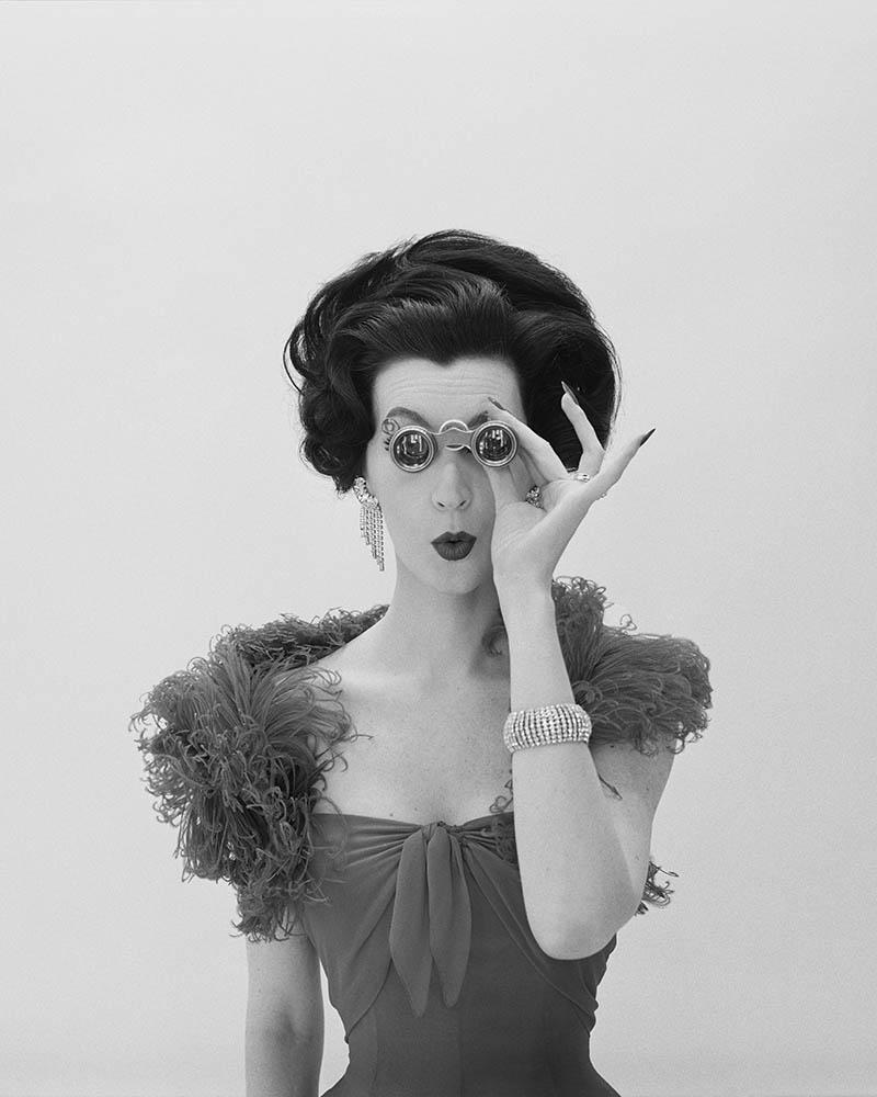 Dovima with Opera Glasses, Corday, 1961 - Photograph by William Helburn
