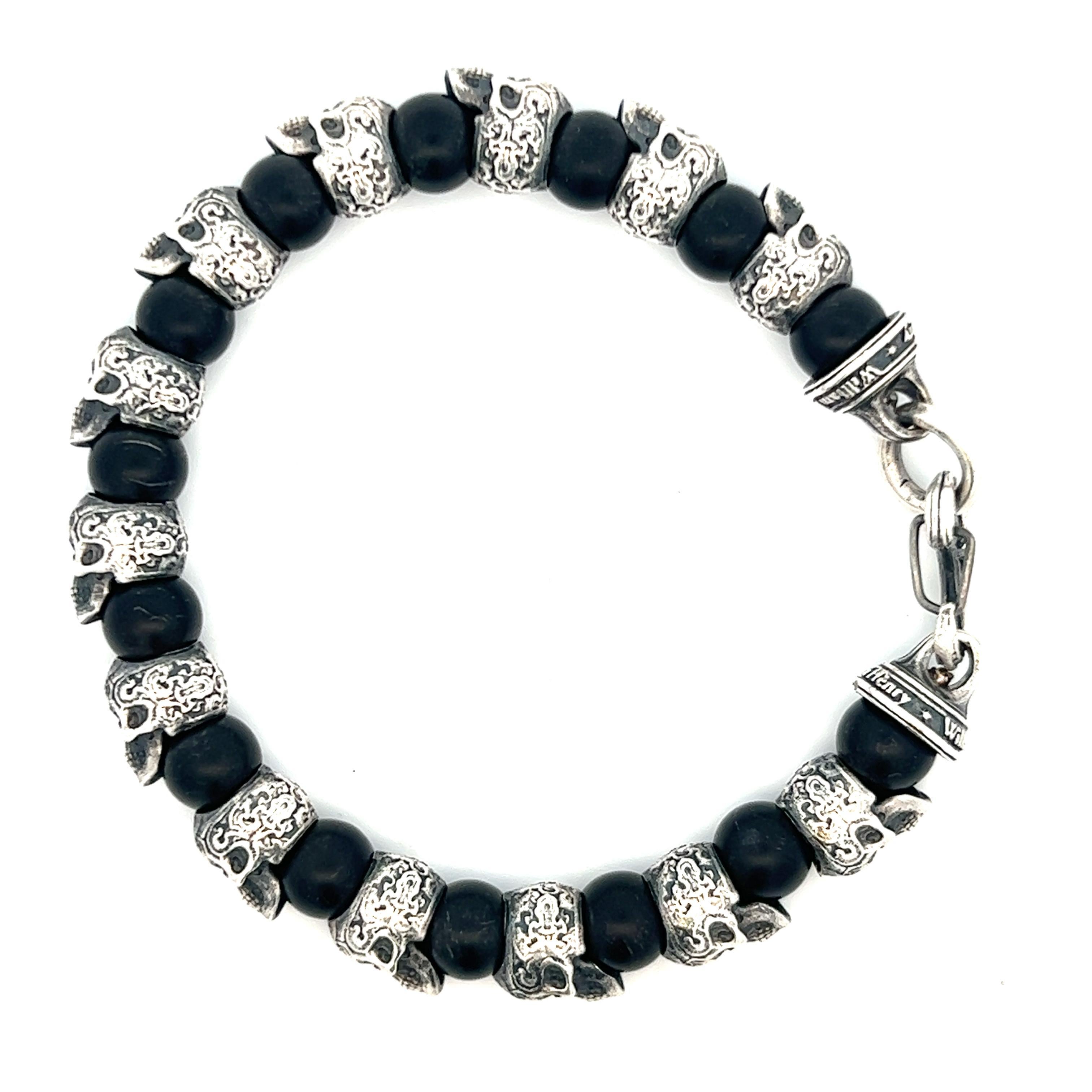 This bracelet is its own class- despite all the beaded bracelets and skulls out there, the 'Shaman' stands apart. Skull beads are sculpted in sterling silver, beautifully rendered based on the powerful 'sugar skull' tradition from Mexico. The clasp