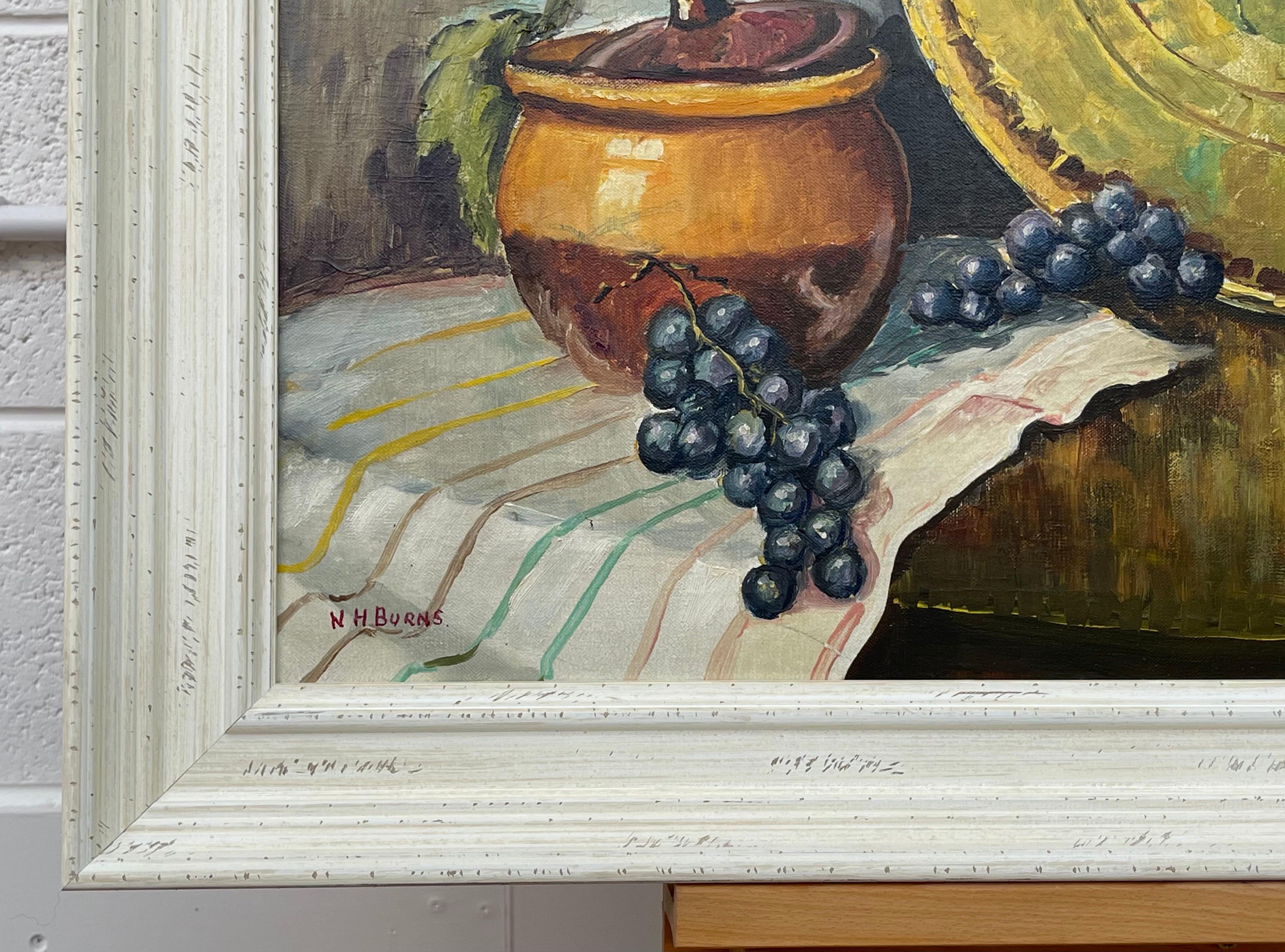 Champagne Bottle with Grapes & Pot Still Life Interior Original Oil Painting by 20th Century Artist Artist William Henry Burns (1924-1995). Framed in a high quality off-white shabby chic contemporary wooden moulding. 

Art measures 30 x 24 inches